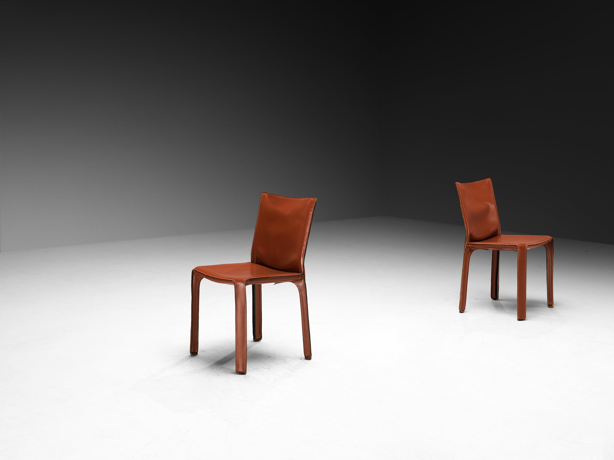 Mario Bellini for Cassina Set of Sixteen 'Cab' Dining Chairs in Red Brown Leather Seating Morentz