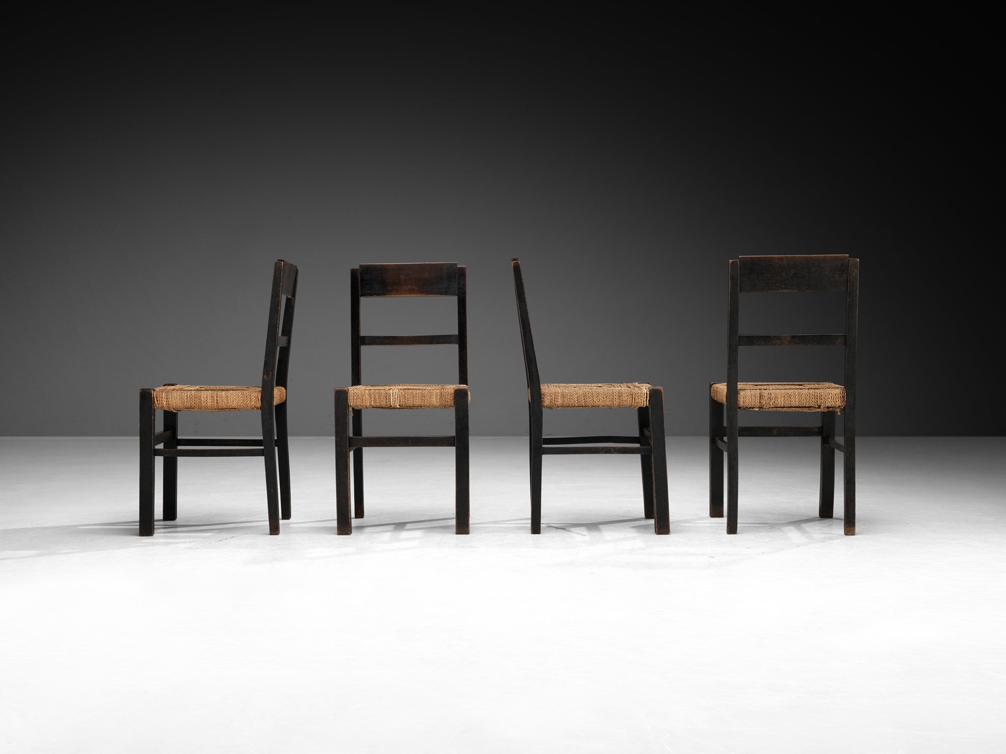 1920s Francis Jourdain Set of Four Dining or Side Chairs in Dark Wood and Rush Seating Morentz