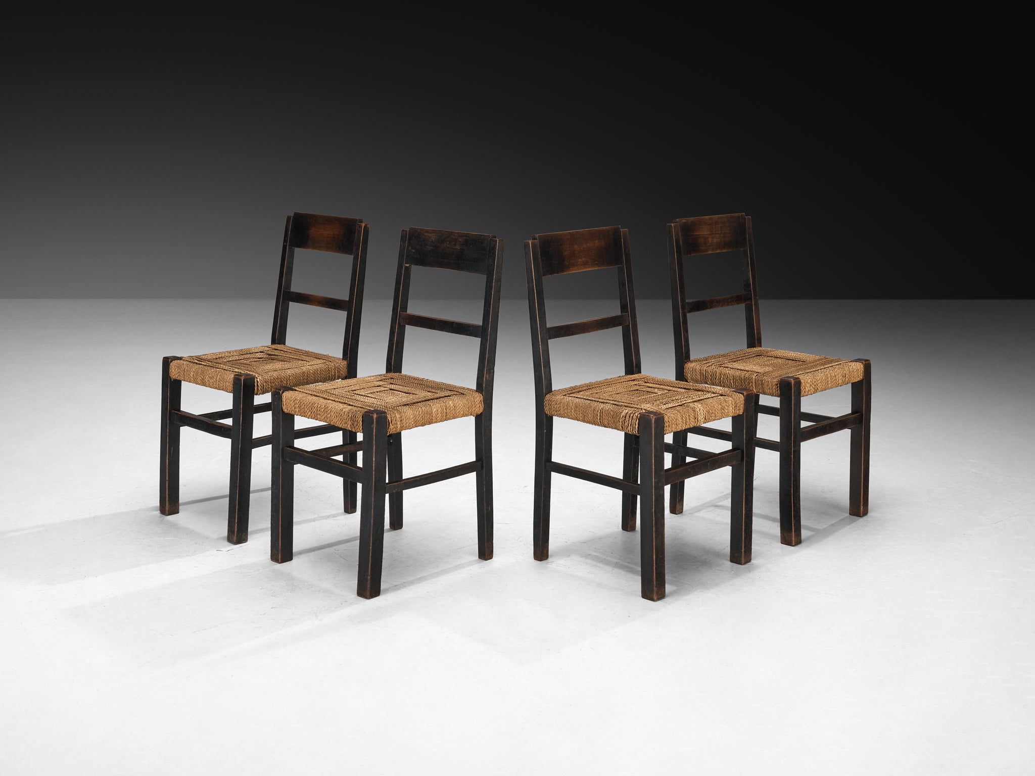 1920s Francis Jourdain Set of Four Dining or Side Chairs in Dark Wood and Rush Seating Morentz