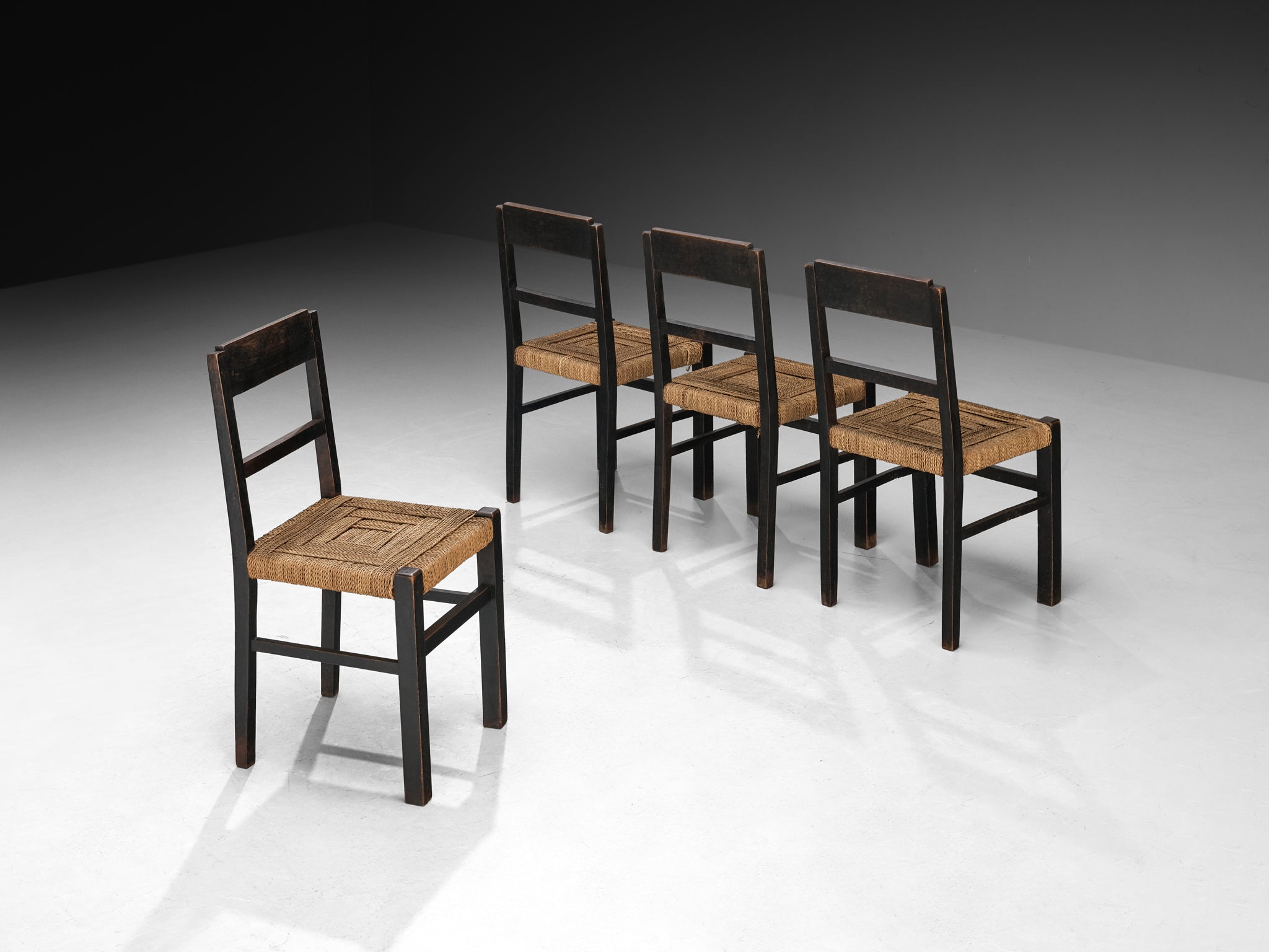 1920s Francis Jourdain Set of Four Dining or Side Chairs in Dark Wood and Rush Seating Morentz