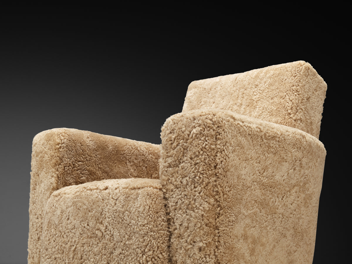 Grand Angular Art Deco Lounge Chairs Newly Upholstered in Sheepskin
