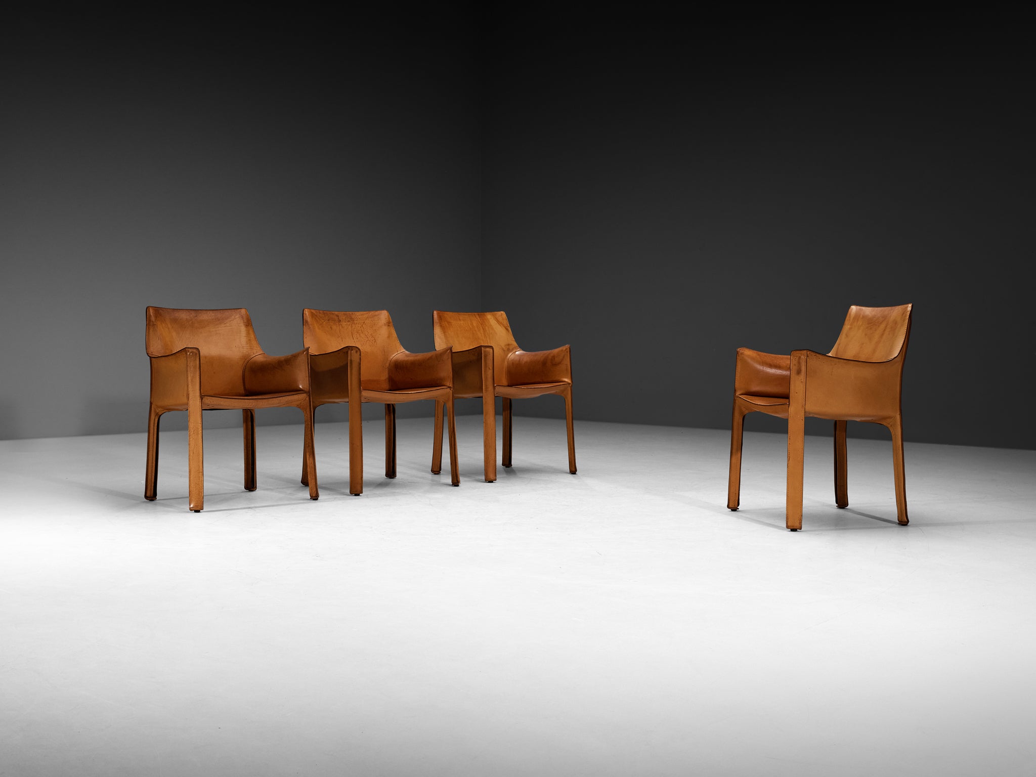 Mario Bellini Set of Four 'CAB 413' Dining Chairs in Patinated Cognac Leather Seating Morentz