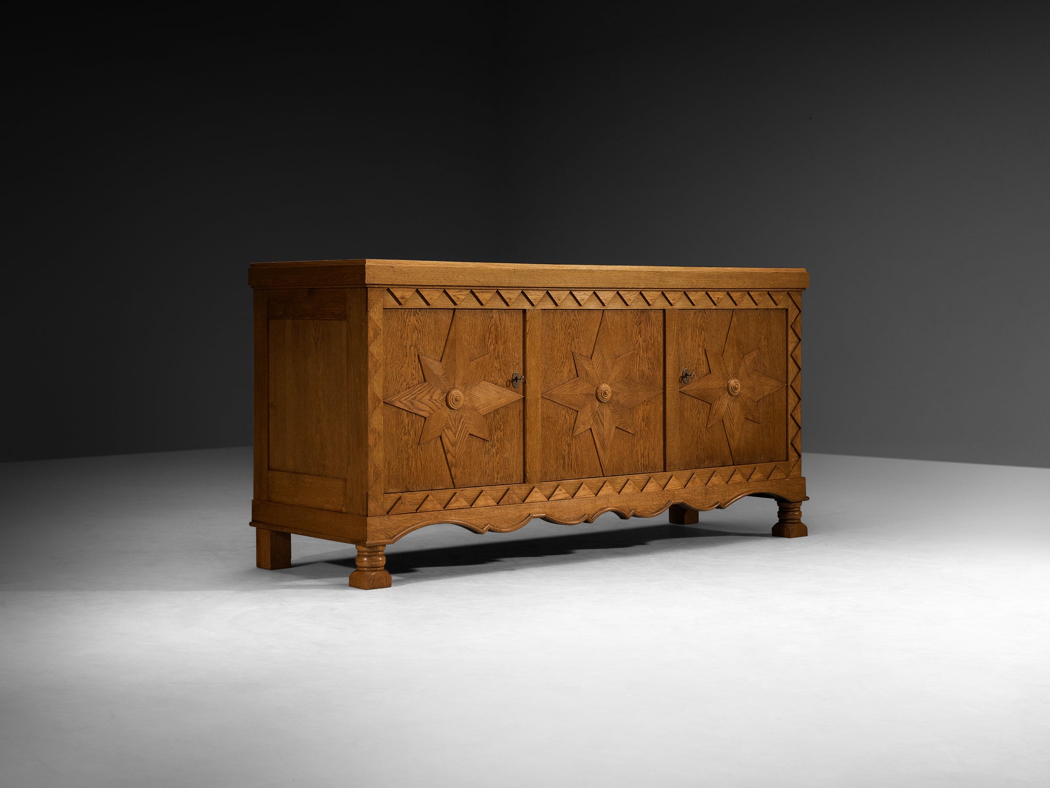 French 1940s Sideboard with Carved Star Motif in Oak Case pieces and storage cabinets Morentz