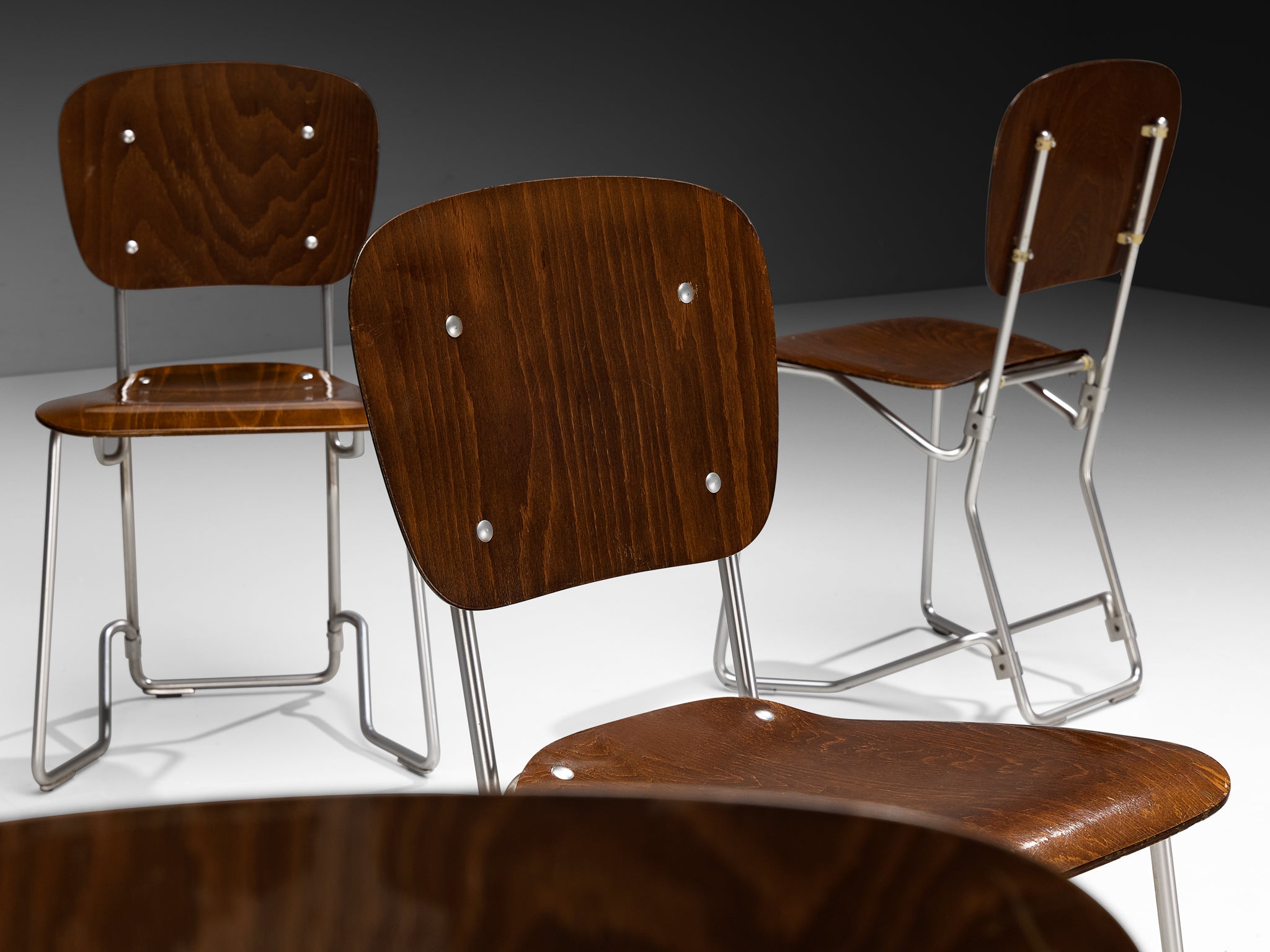 Armin Wirth 'Aluflex' Folding and Nesting Chairs in Rare Dark Plywood and Aluminum Seating Morentz