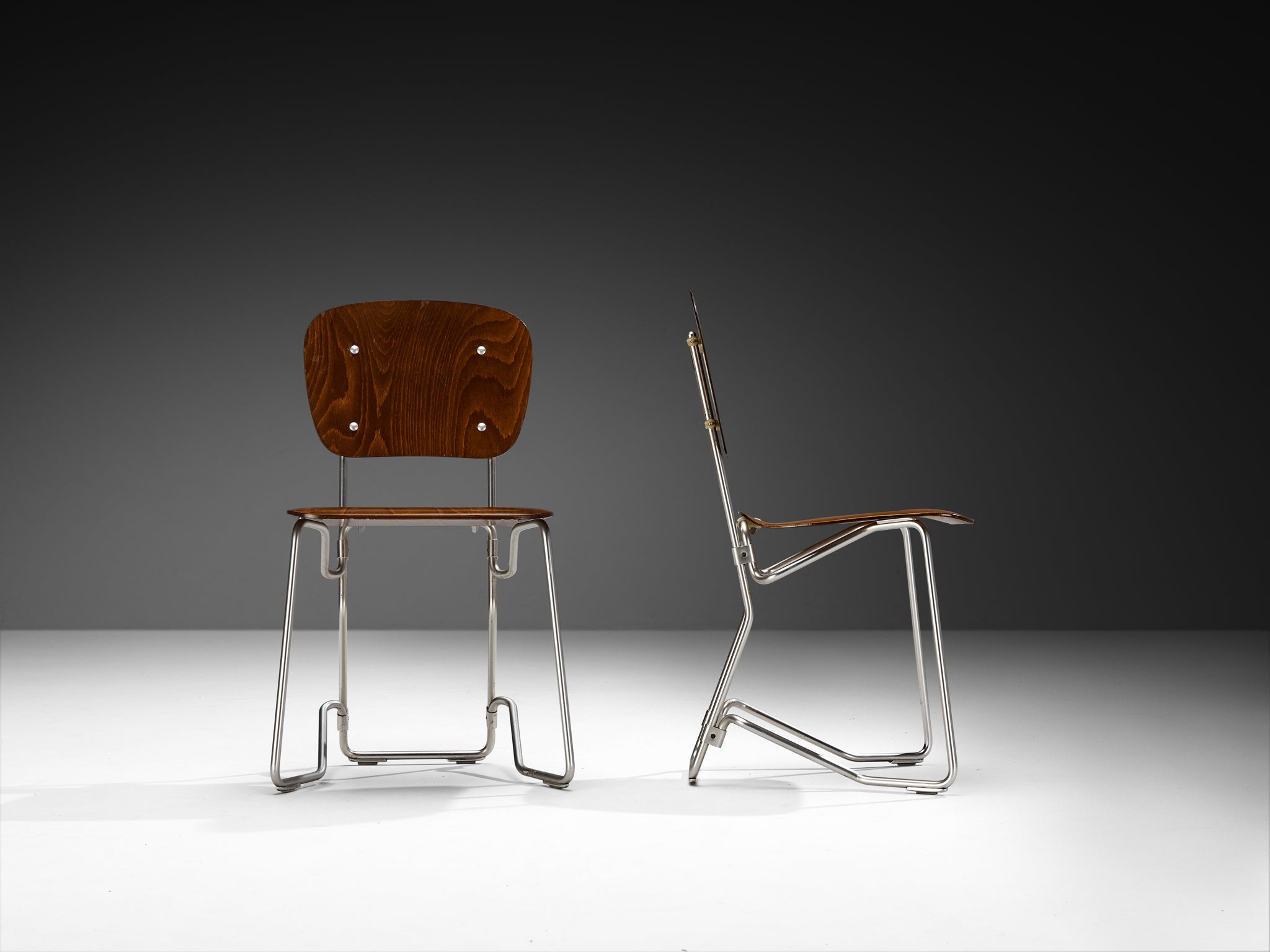 Armin Wirth 'Aluflex' Folding and Nesting Chairs in Rare Dark Plywood and Aluminum Seating Morentz