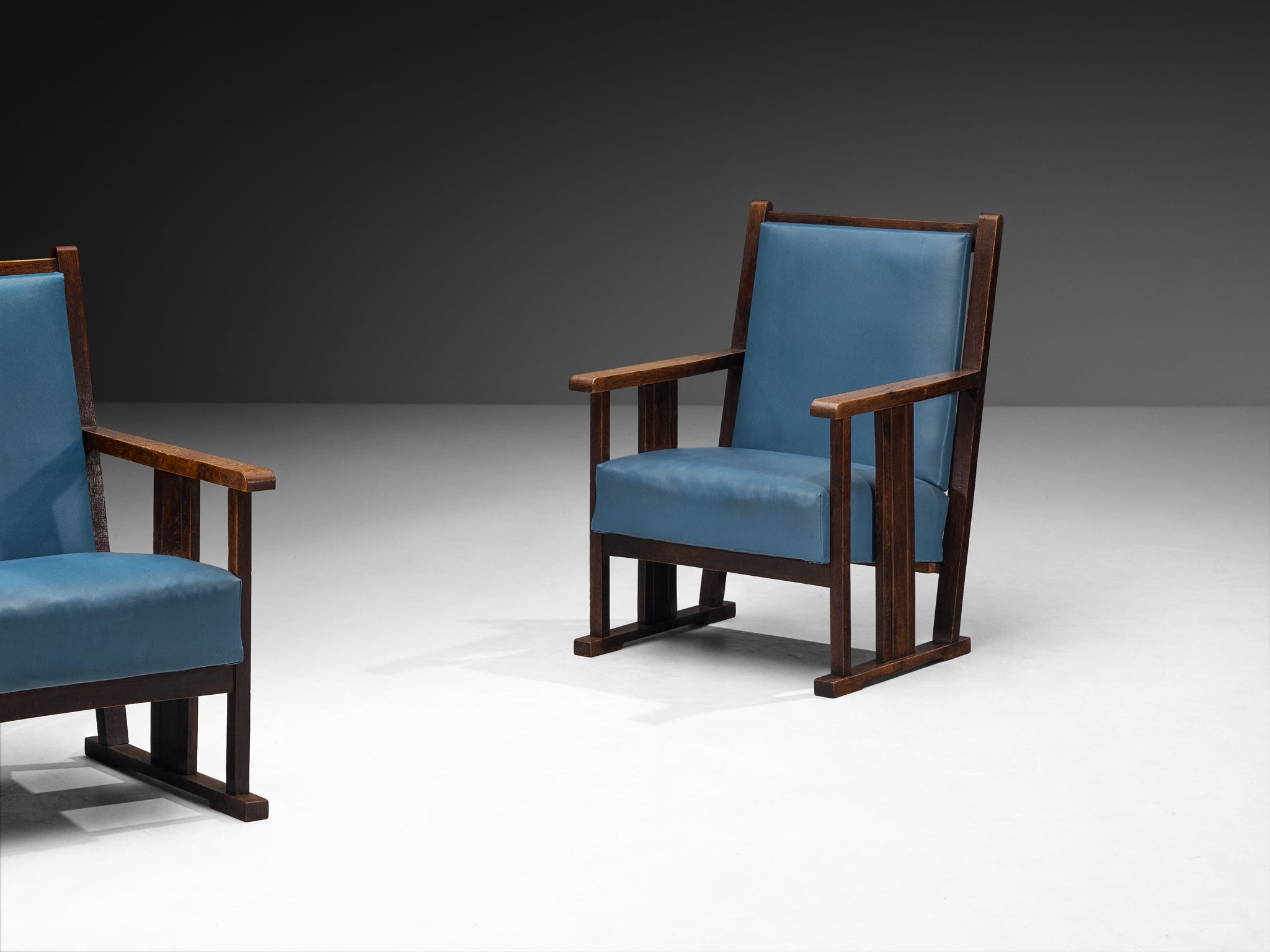 Pair of Dutch Amsterdam School Oak Lounge Chairs in Oak and Blue Leatherette