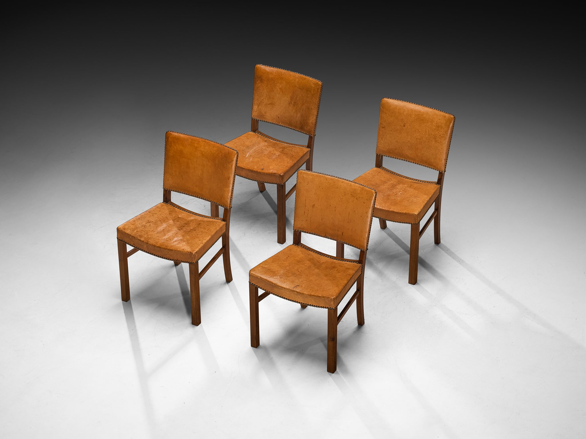 Set of Four Dining Chairs in Original Patinated Cognac Leather and Teak