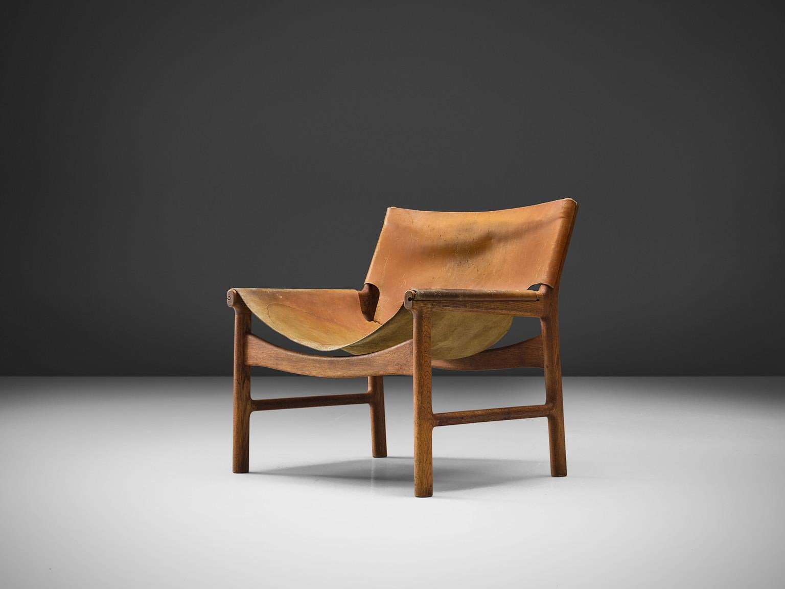 Illum Wikkelsø Easy Chair in Oak and Leather seating Morentz