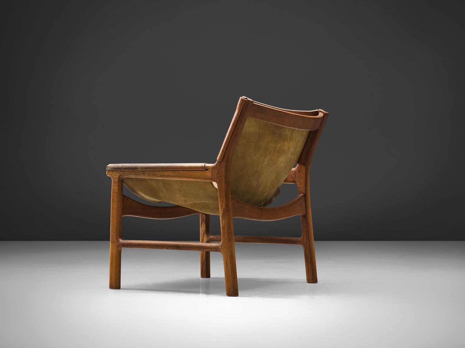 Illum Wikkelsø Easy Chair in Oak and Leather seating Morentz