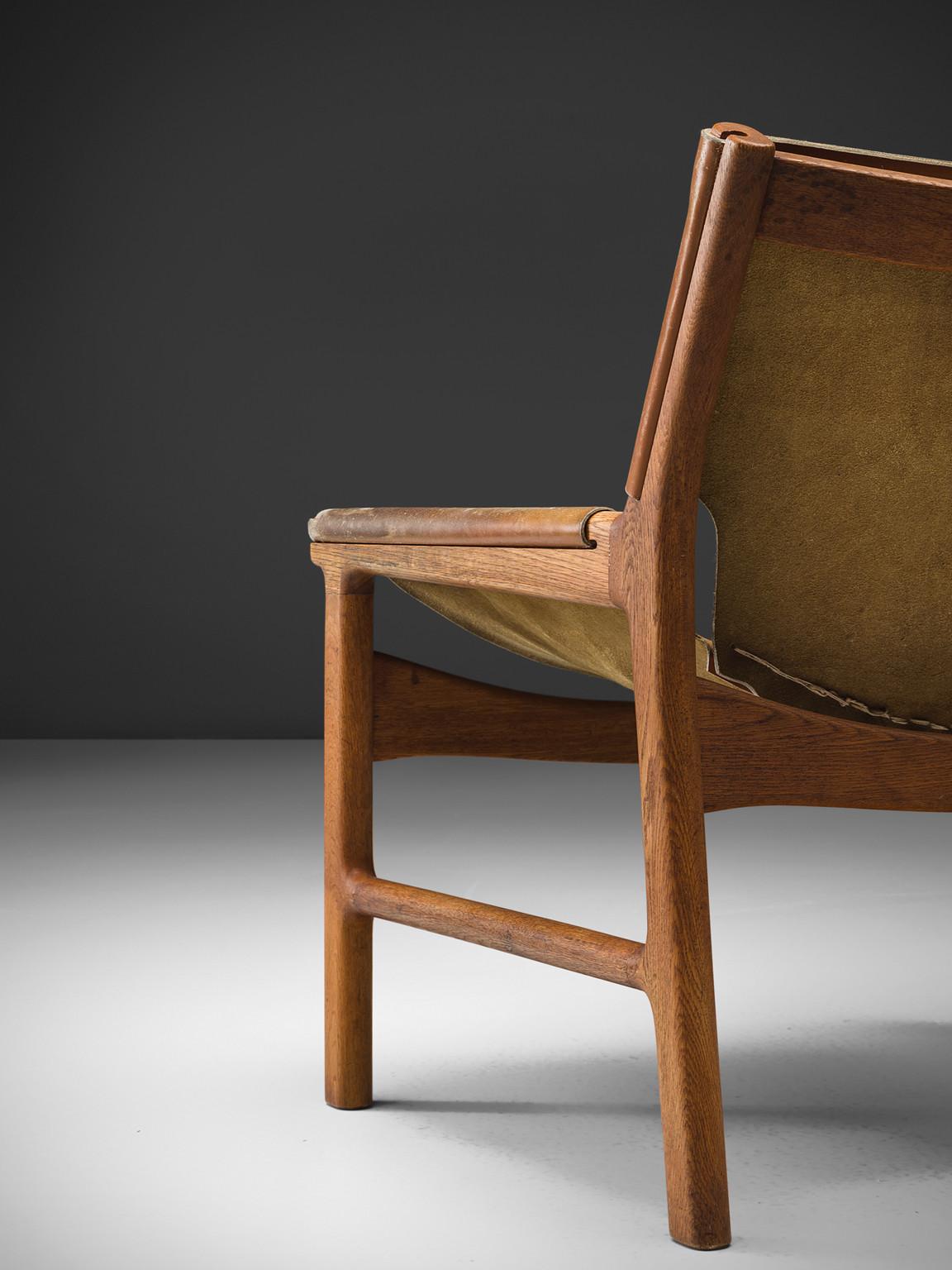 Illum Wikkelsø Easy Chair in Oak and Leather seating Morentz