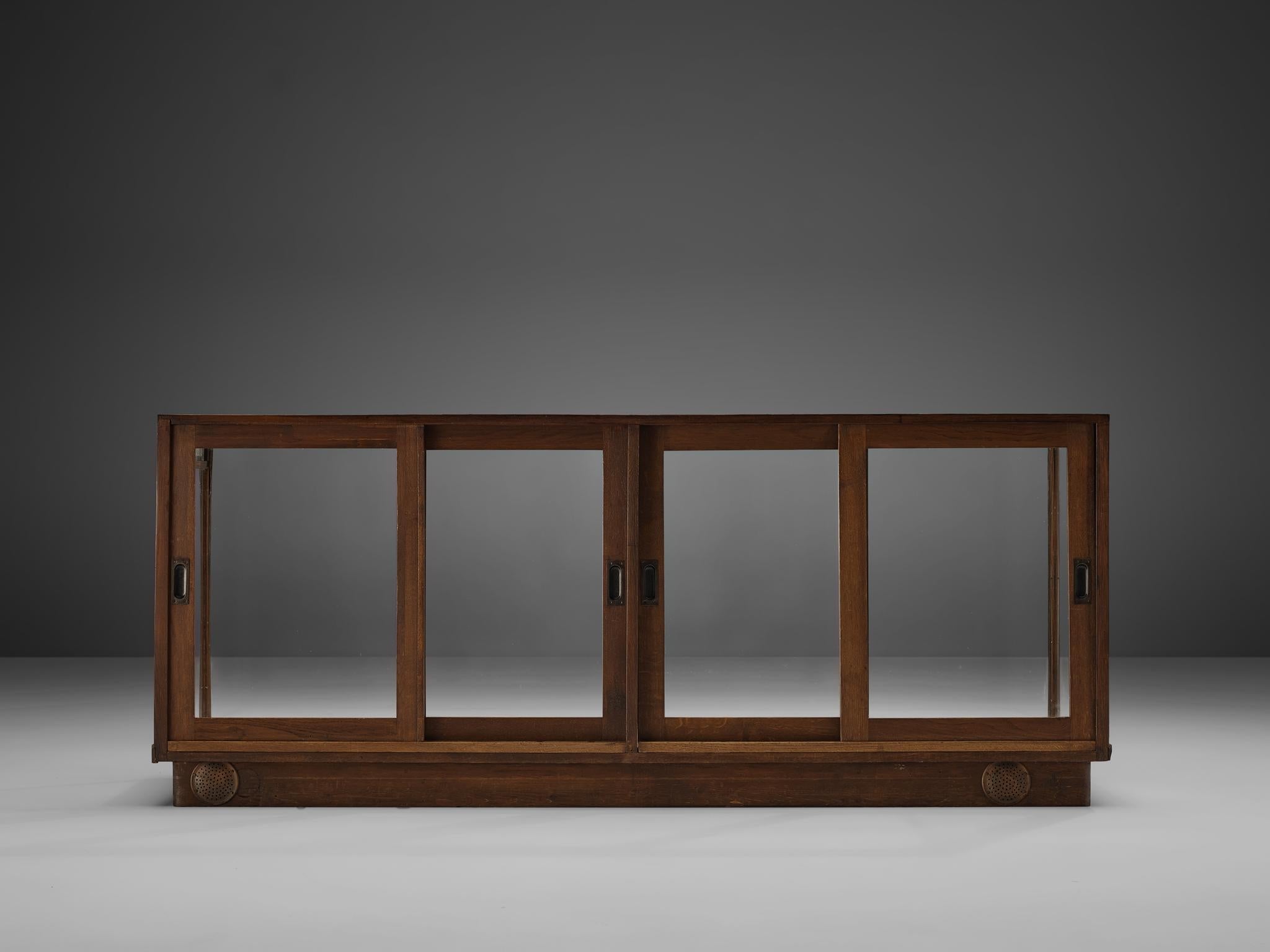 Large Art Deco Showcase in Stained Oak and Glass case pieces and storage cabinets Morentz