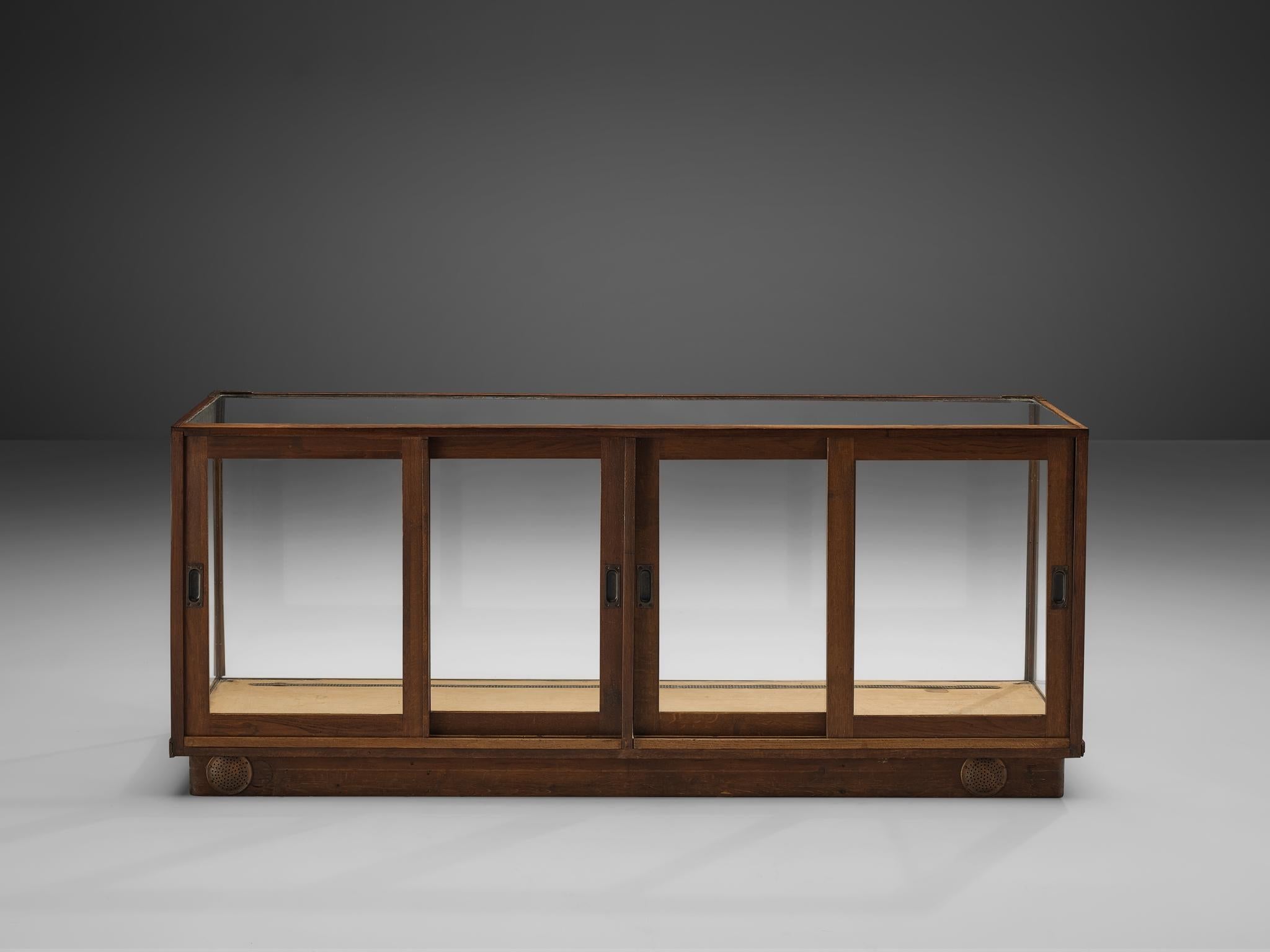 Large Art Deco Showcase in Stained Oak and Glass case pieces and storage cabinets Morentz