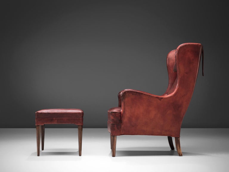 Frits Henningsen Lounge Chair with Ottoman in Original Burgundy Leather