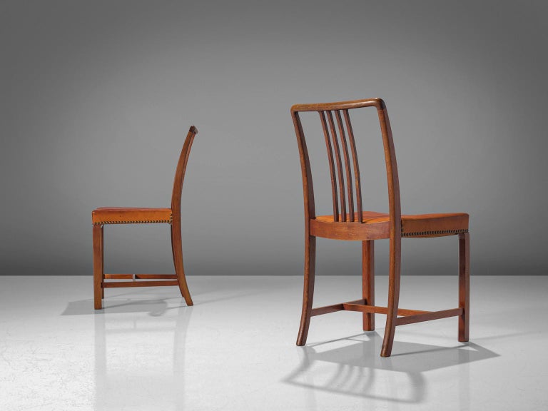 Jørgen Christensens Set of Eight Dining Chairs in Cognac Leather and Oak