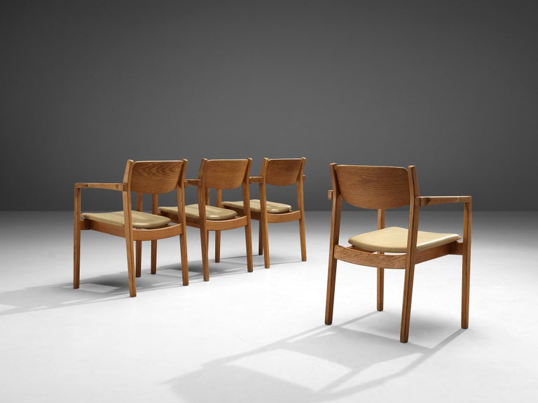 Danish Set of Four Armchairs in Oak and Beige Leatherette