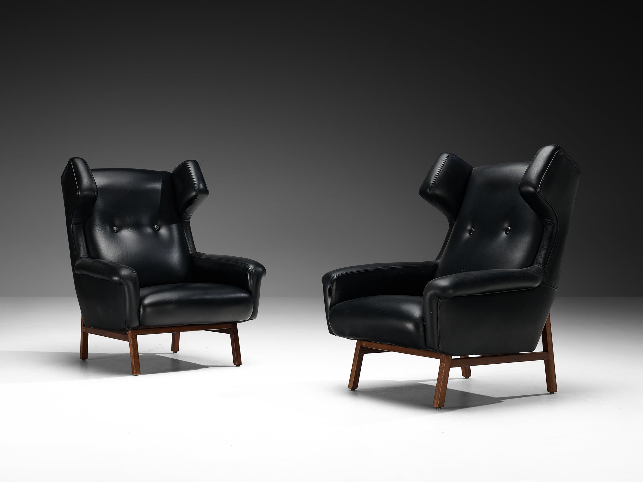 Italian Pair of Wingback Lounge Chairs in Black Leather and Mahogany Seating Morentz