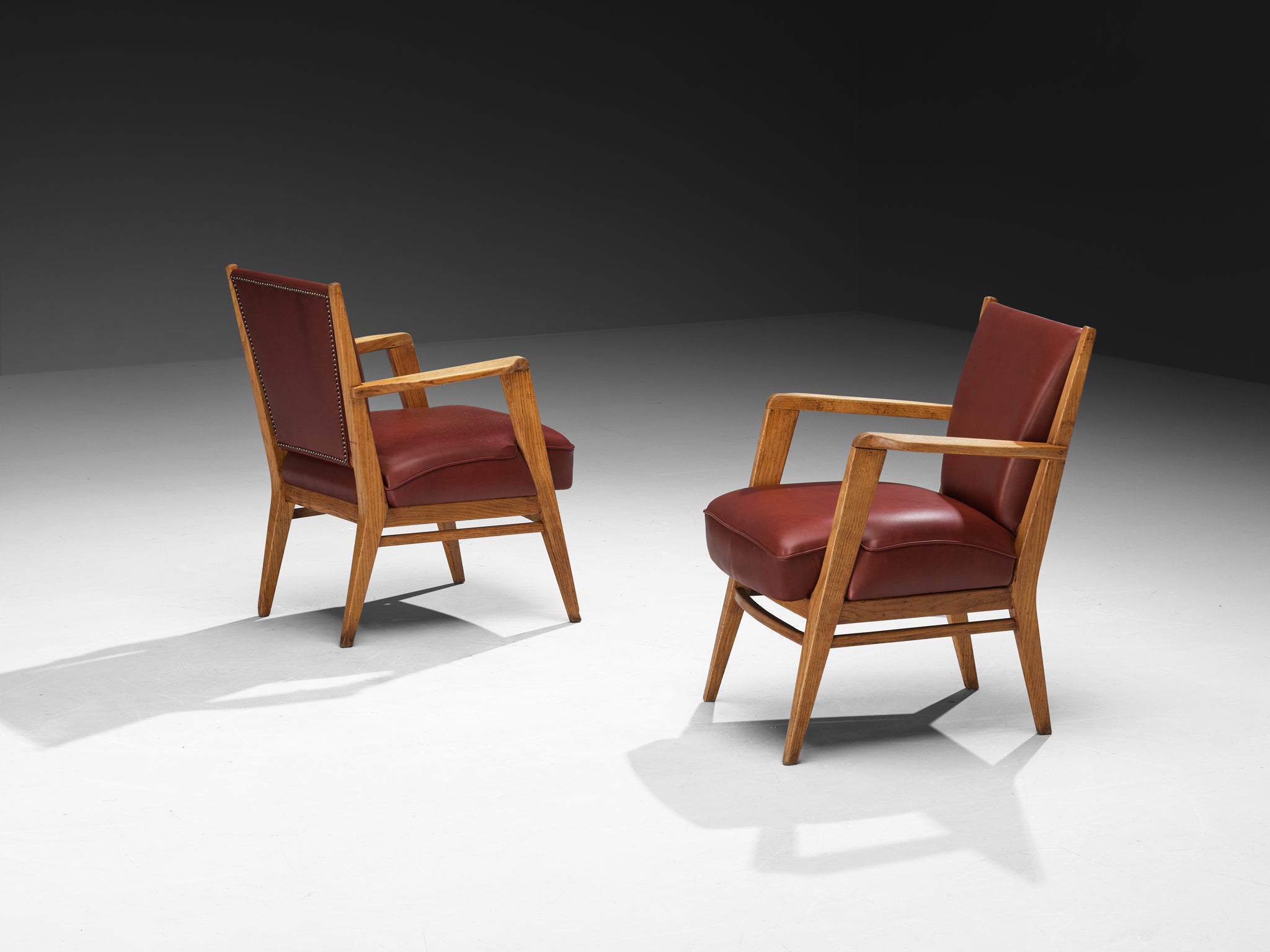 Studio B.B.P.R. Lounge Chairs in Burgundy Red Leather and Oak Seating Morentz