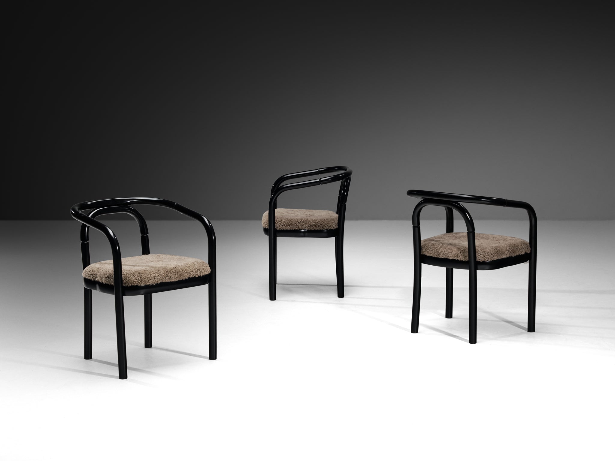 Sculptural Bentwood Armchairs in Black Lacquered Wood and Sheepskin