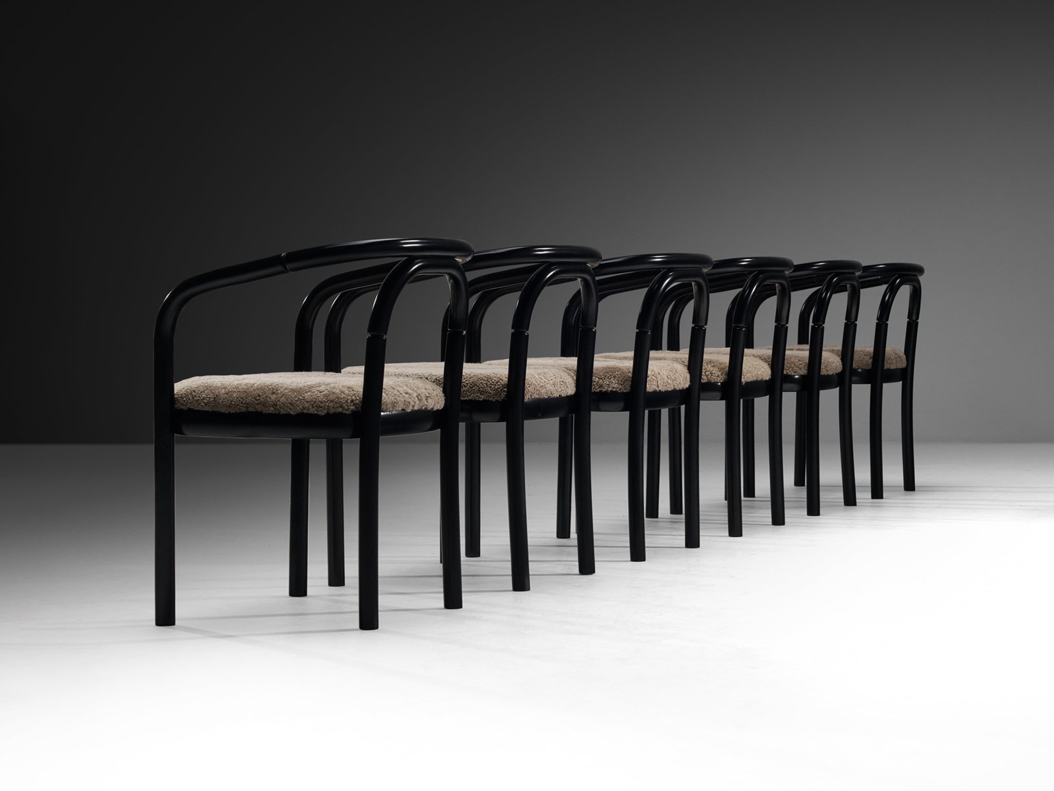 Sculptural Bentwood Armchairs in Black Lacquered Wood and Sheepskin Seating Morentz