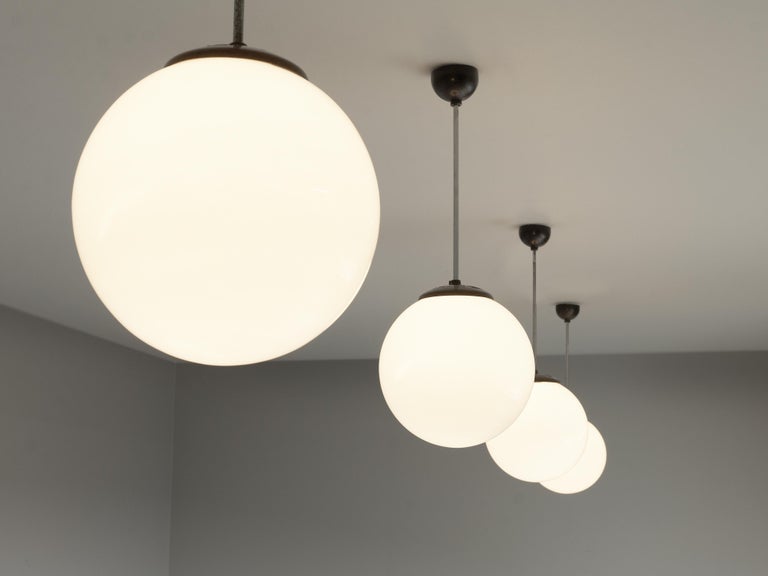Circular Pendant Lamps in White Opaque Glass