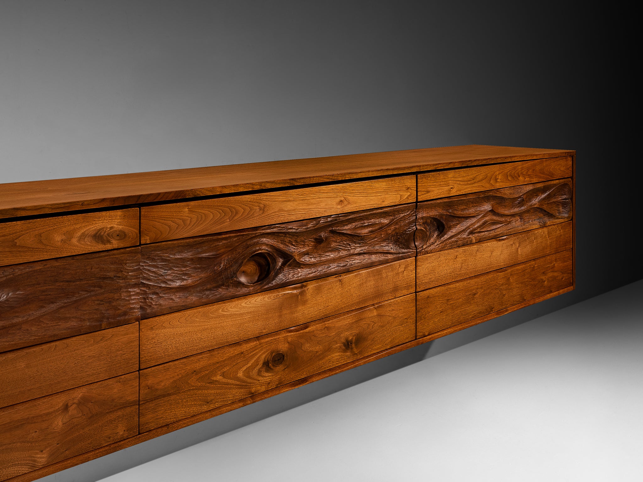 Phillip Lloyd Powell Long Wall-Mounted Sideboard in Carved Walnut