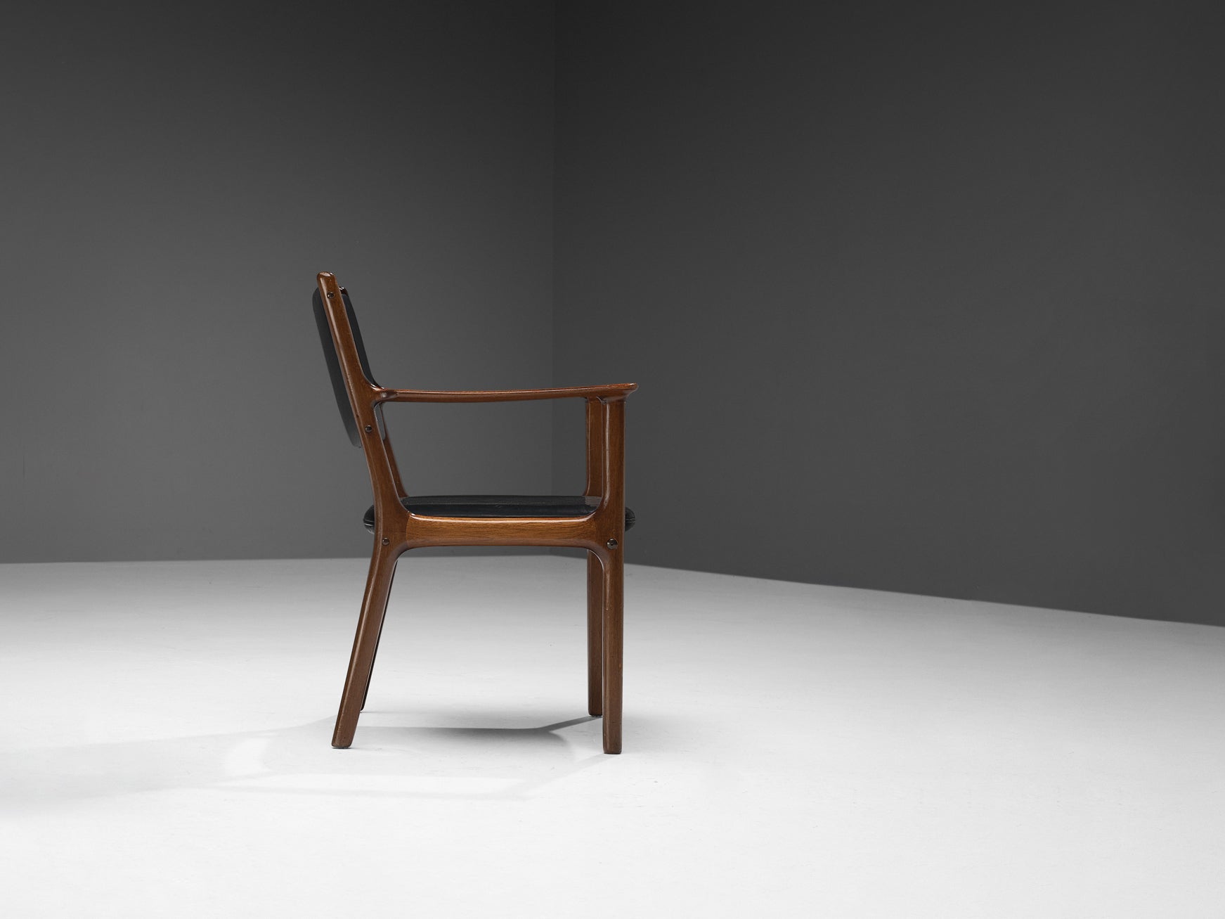 Ole Wanscher for Poul Jeppesen Armchair in Teak and Black Leather seating Morentz