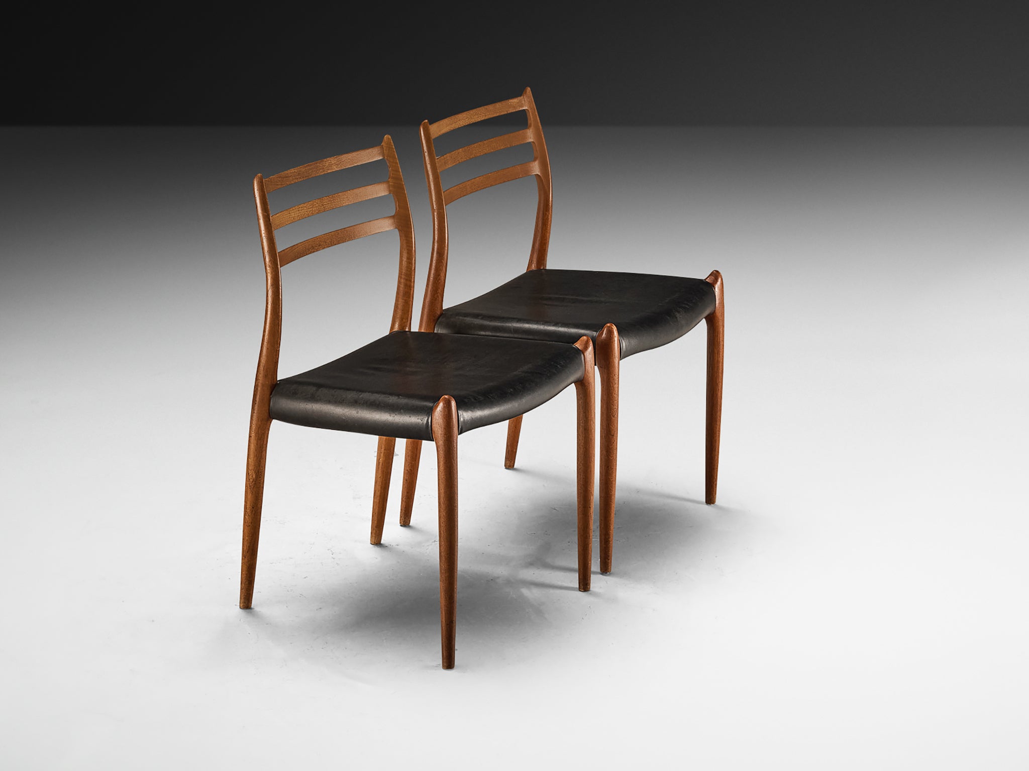 Niels Otto Møller Pair of Dining Chairs in Teak and Leather Seating Morentz