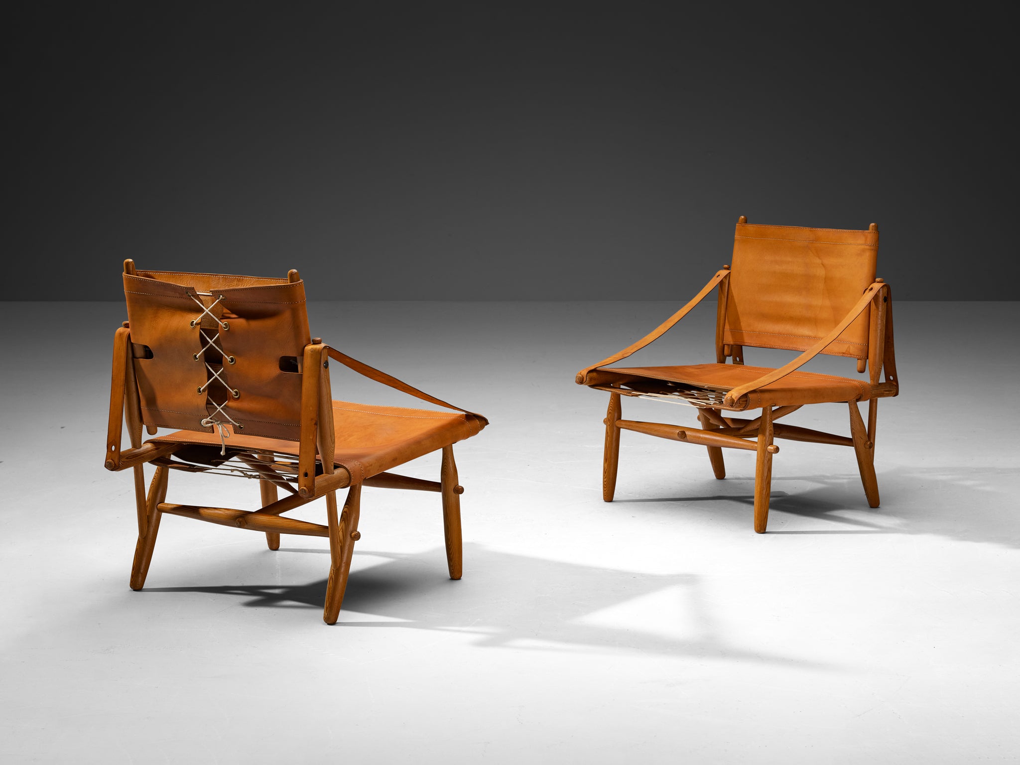 Rare Ilmari Tapiovaara for Lukkiseppo 'Chaco' Lounge Chairs in Cognac Leather and Pine Seating Morentz