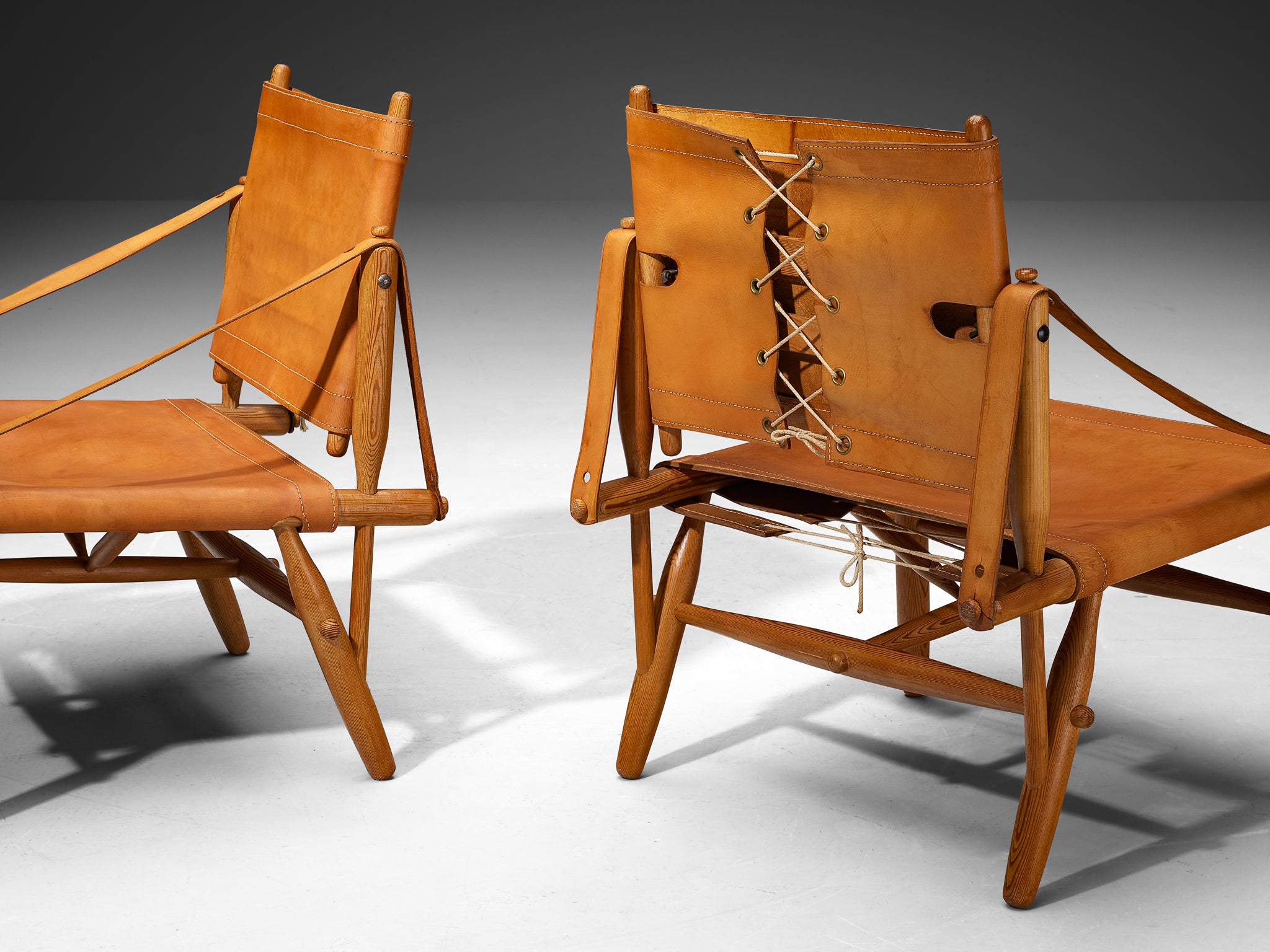 Rare Ilmari Tapiovaara for Lukkiseppo 'Chaco' Lounge Chairs in Cognac Leather and Pine Seating Morentz