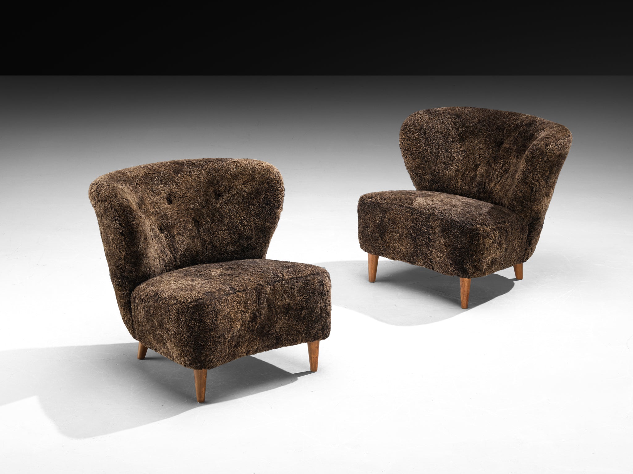 Gösta Jonsson Pair of Lounge Chairs in Dark Brown Sheepskin Seating Morentz