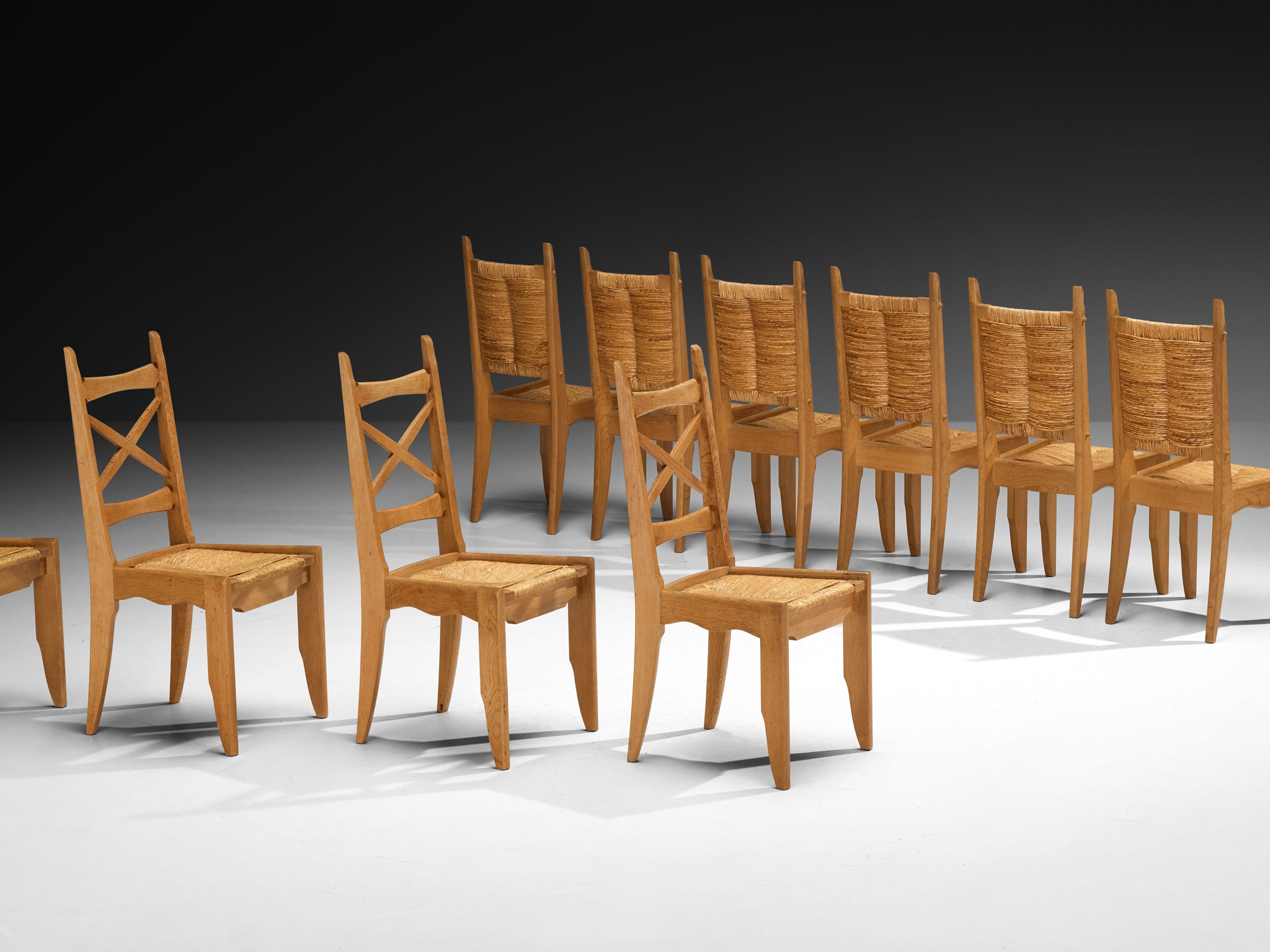 Guillerme & Chambron Set of Twelve Dining Chairs in Oak and Straw Seating Morentz