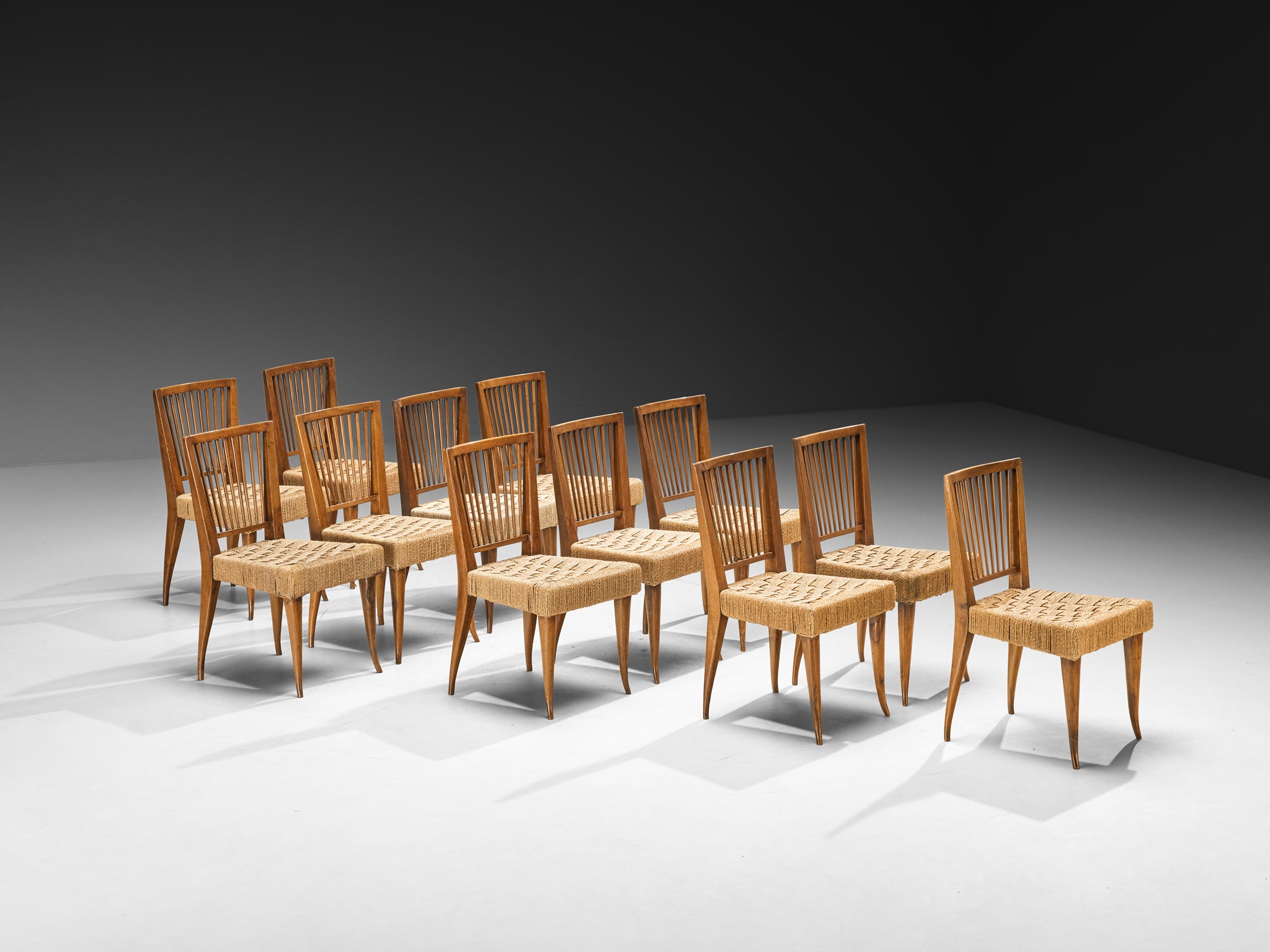 1940s Set of Twelve Italian Dining Chairs in Walnut and Rush Seating Morentz