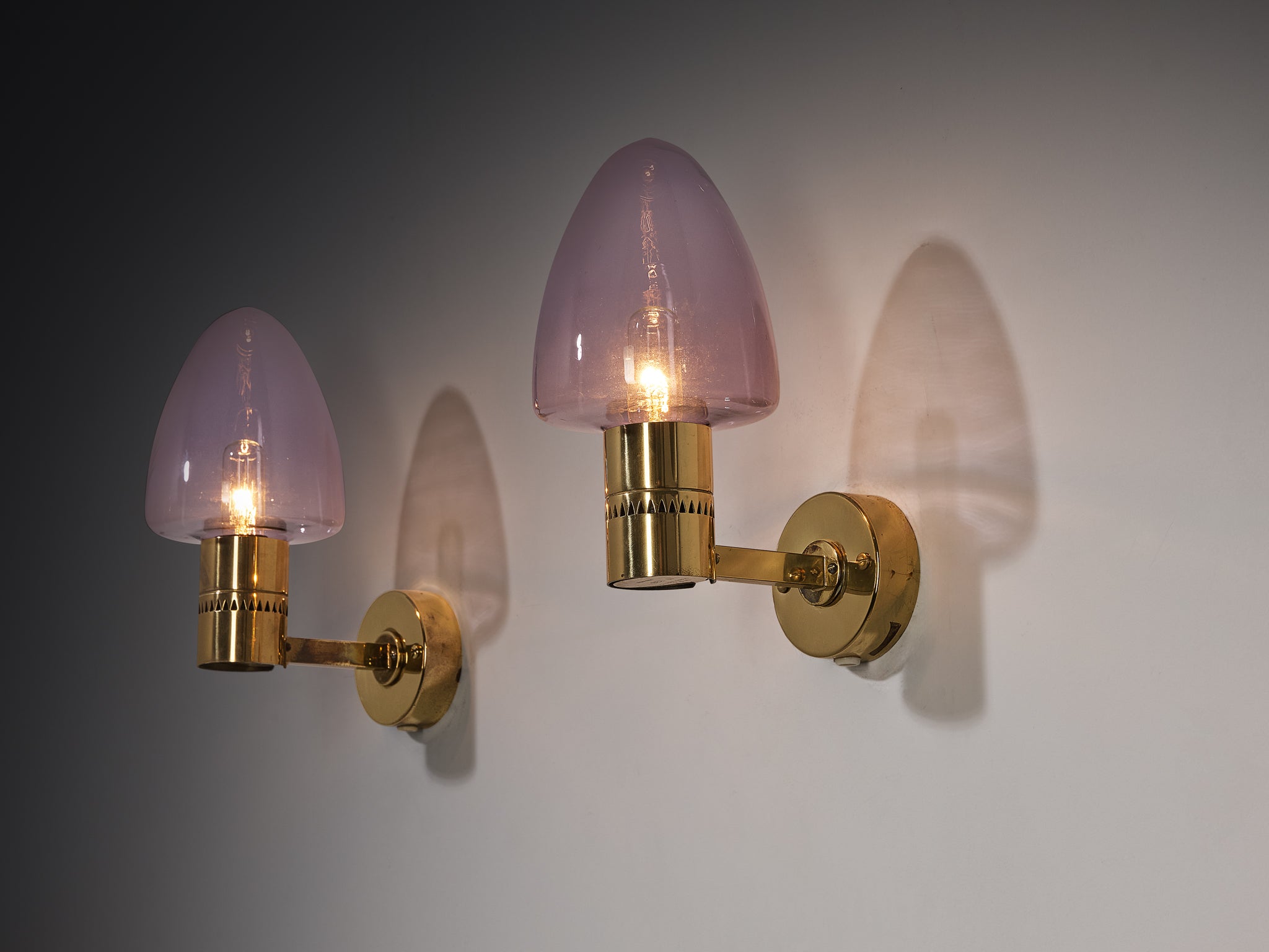 Hans-Agne Jakobsson Wall Lamps 'V-220' in Brass and Purple Glass