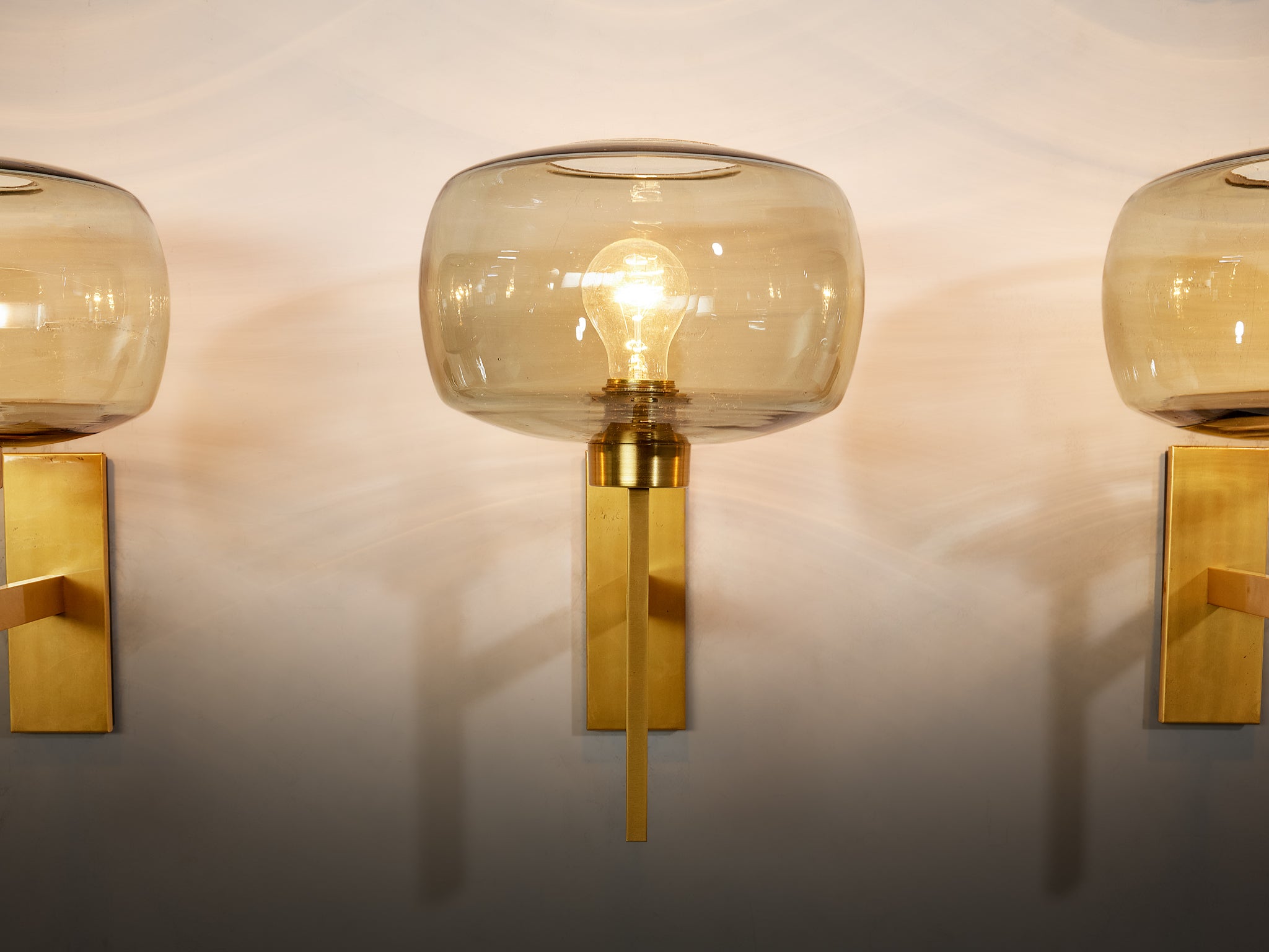 Holger Johansson for Westal Set of Four Wall Lights in Brass and Smoked Glass Lighting Morentz