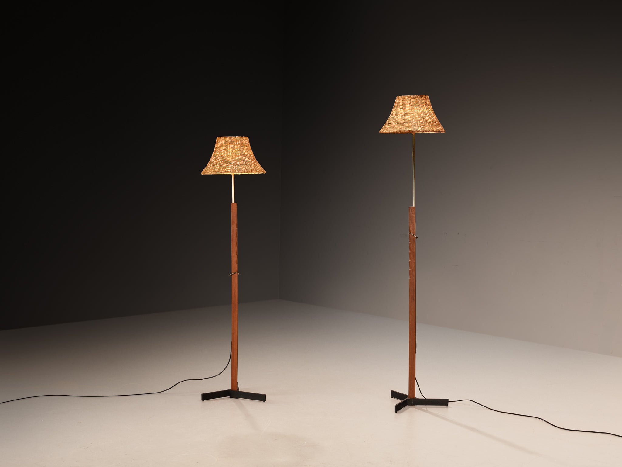 Rare Svend Aage Holm Sørensen Pair of Adjustable Floor Lamps in Cane and Teak