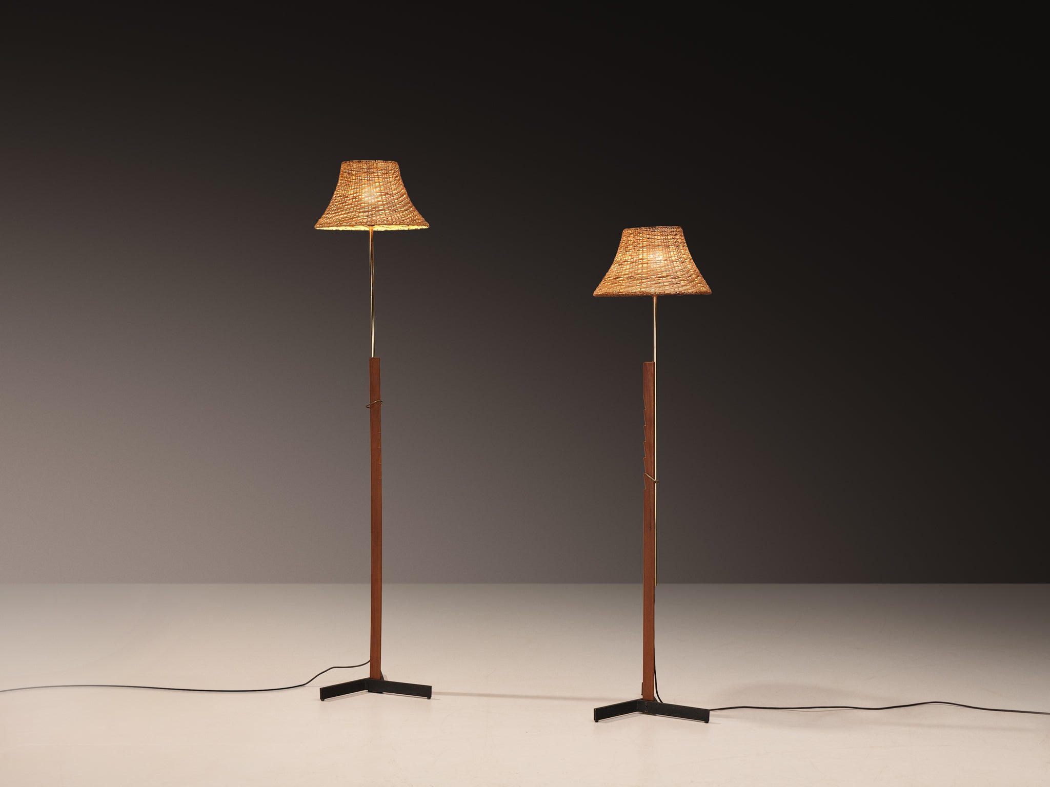 Rare Svend Aage Holm Sørensen Pair of Adjustable Floor Lamps in Cane and Teak