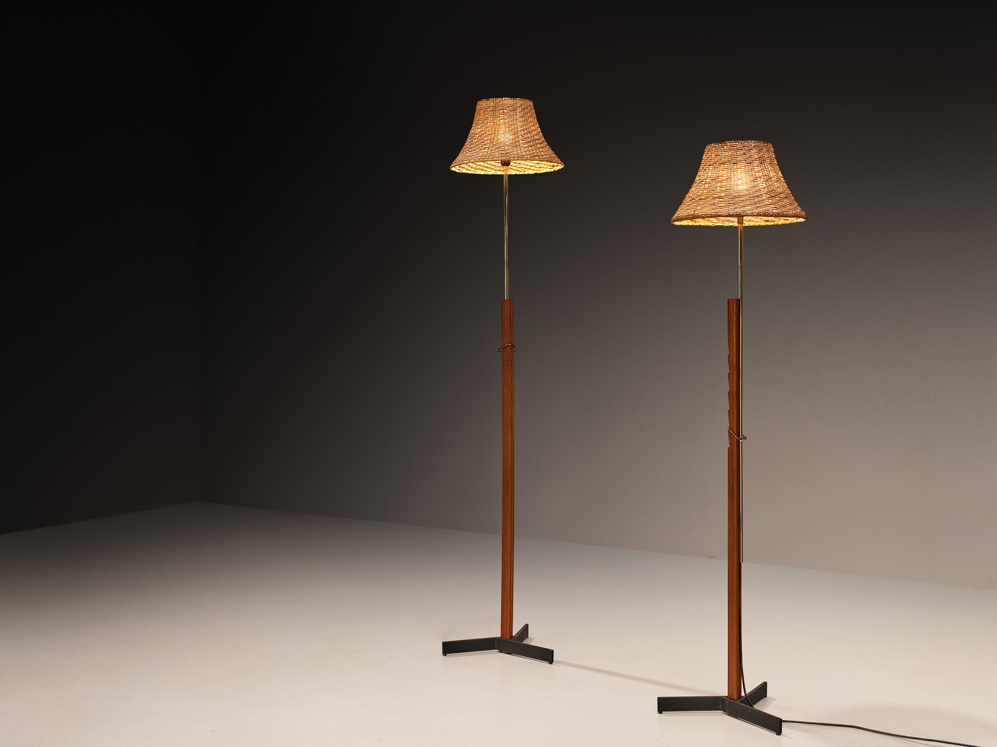 Rare Svend Aage Holm Sørensen Pair of Adjustable Floor Lamps in Cane and Teak