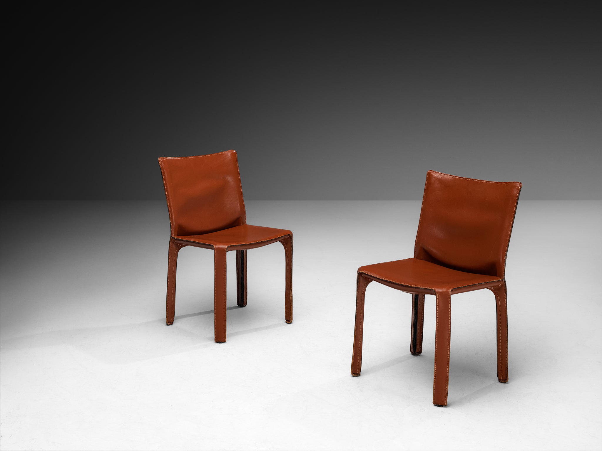 Mario Bellini for Cassina Set of Eight 'Cab' Dining Chairs in Red Brown Leather Seating Morentz
