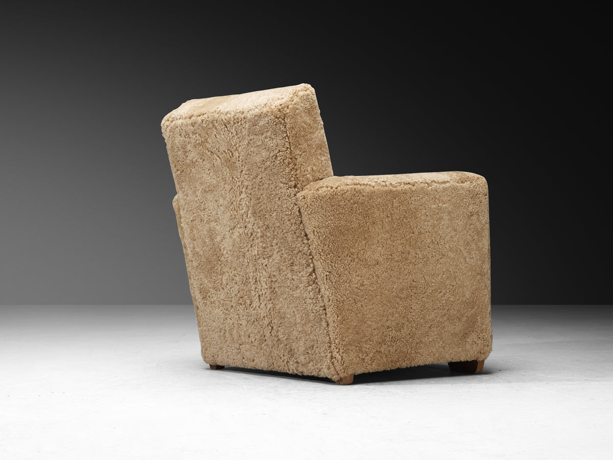Grand Angular Art Deco Lounge Chairs Newly Upholstered in Sheepskin