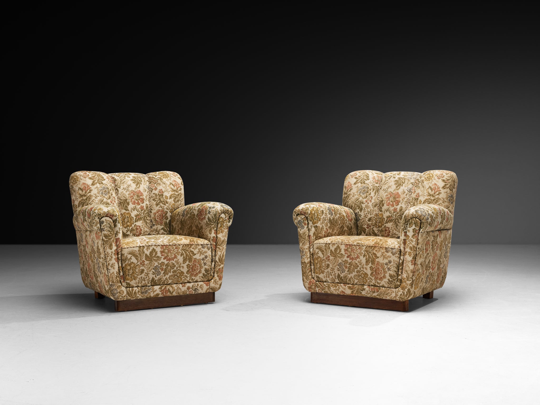 Pair of Lounge Chairs in Floral Pattern on Platform Base