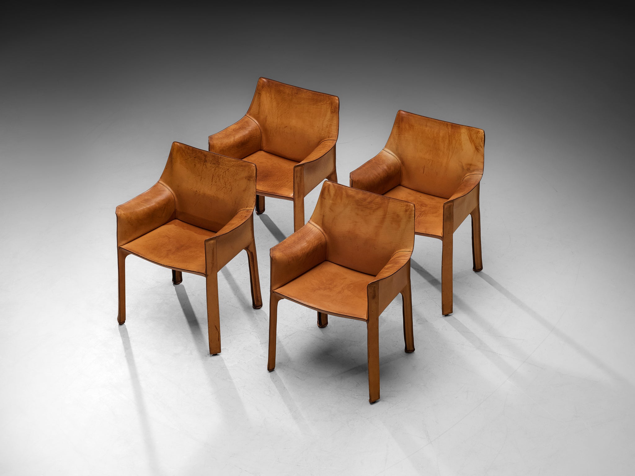 Mario Bellini Set of Four 'CAB 413' Dining Chairs in Patinated Cognac Leather Seating Morentz