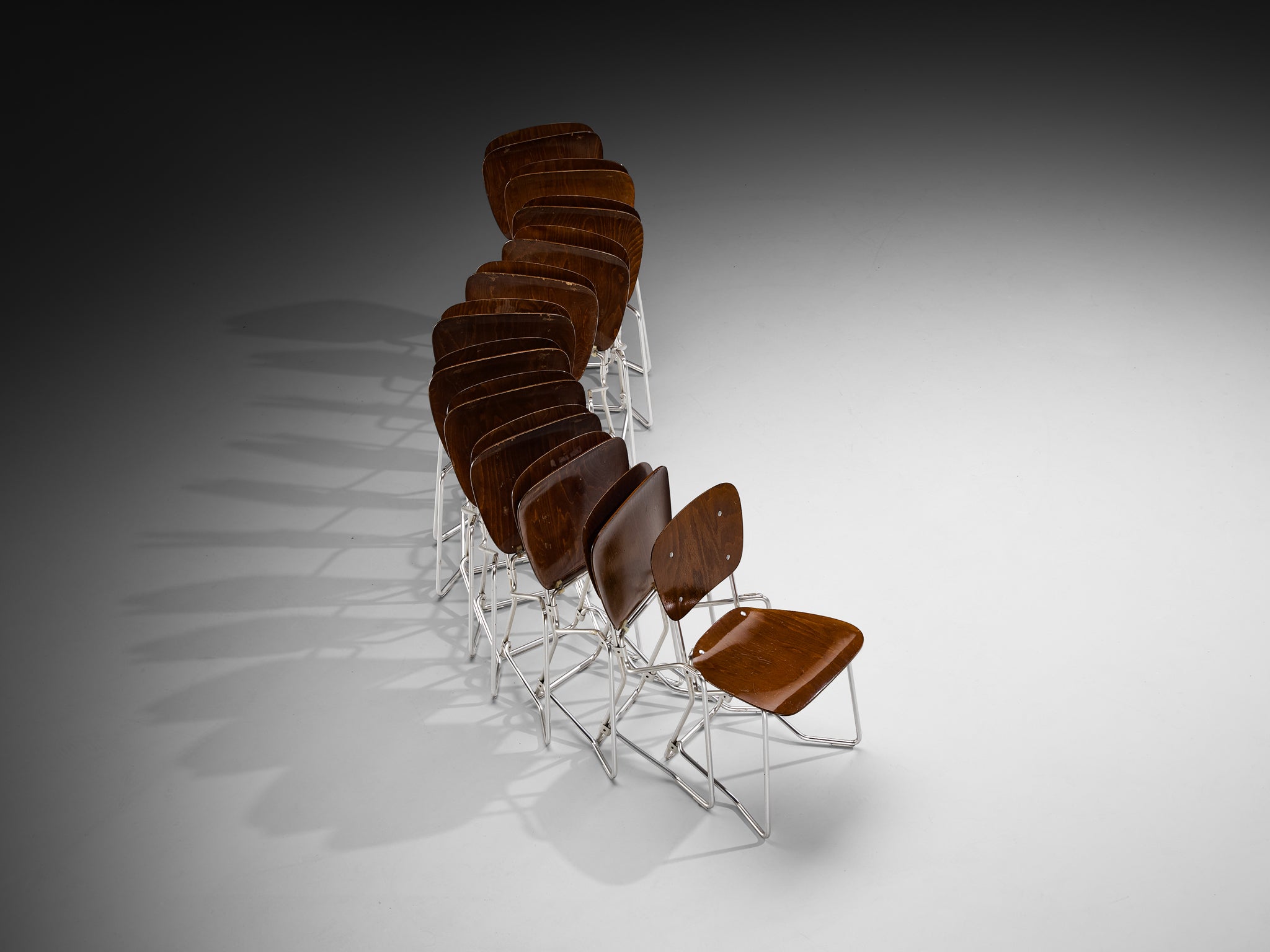 Armin Wirth 'Aluflex' Folding and Nesting Chairs in Rare Dark Plywood and Aluminum