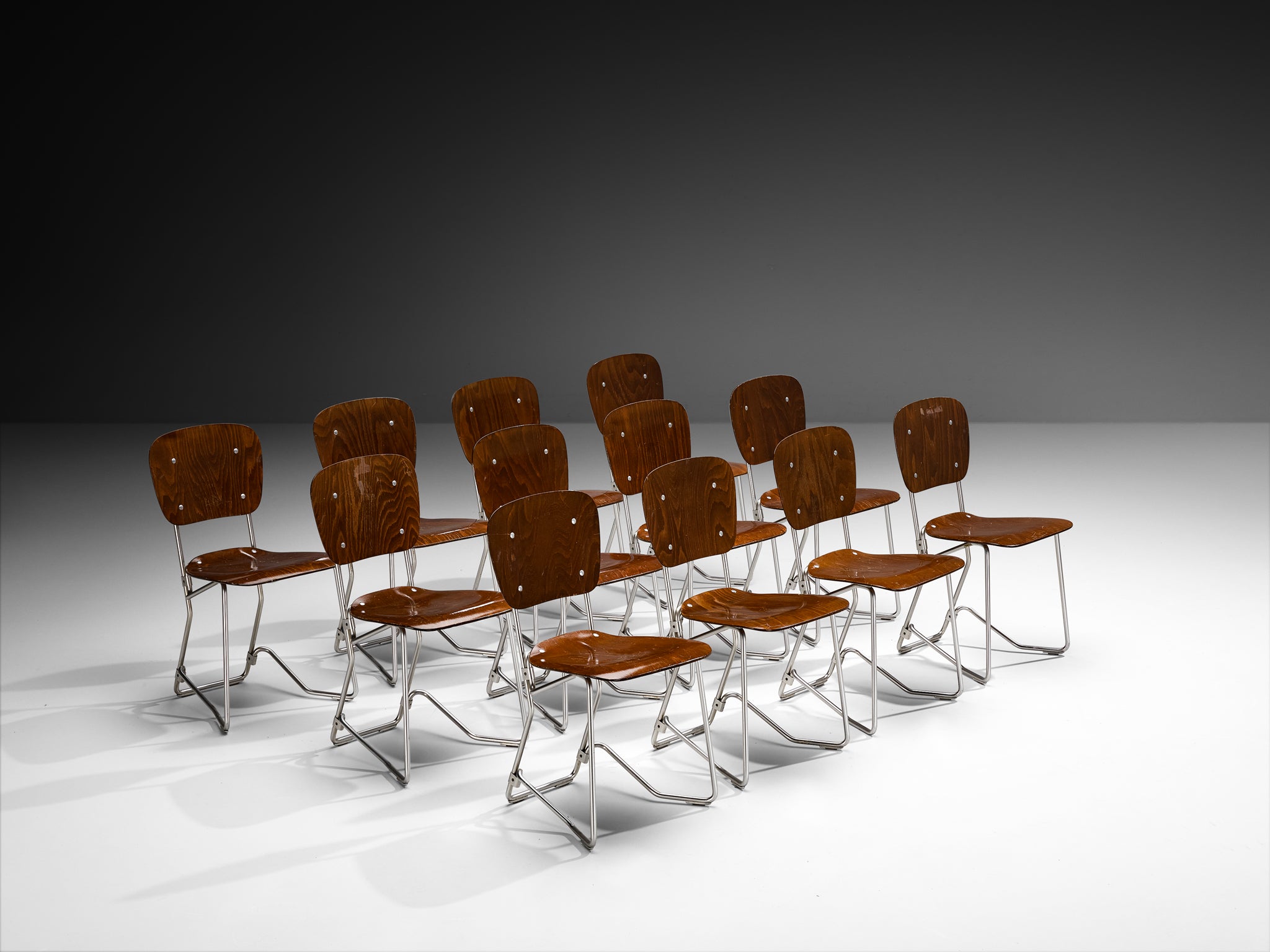 Armin Wirth 'Aluflex' Folding and Nesting Chairs in Rare Dark Plywood and Aluminum Seating Morentz
