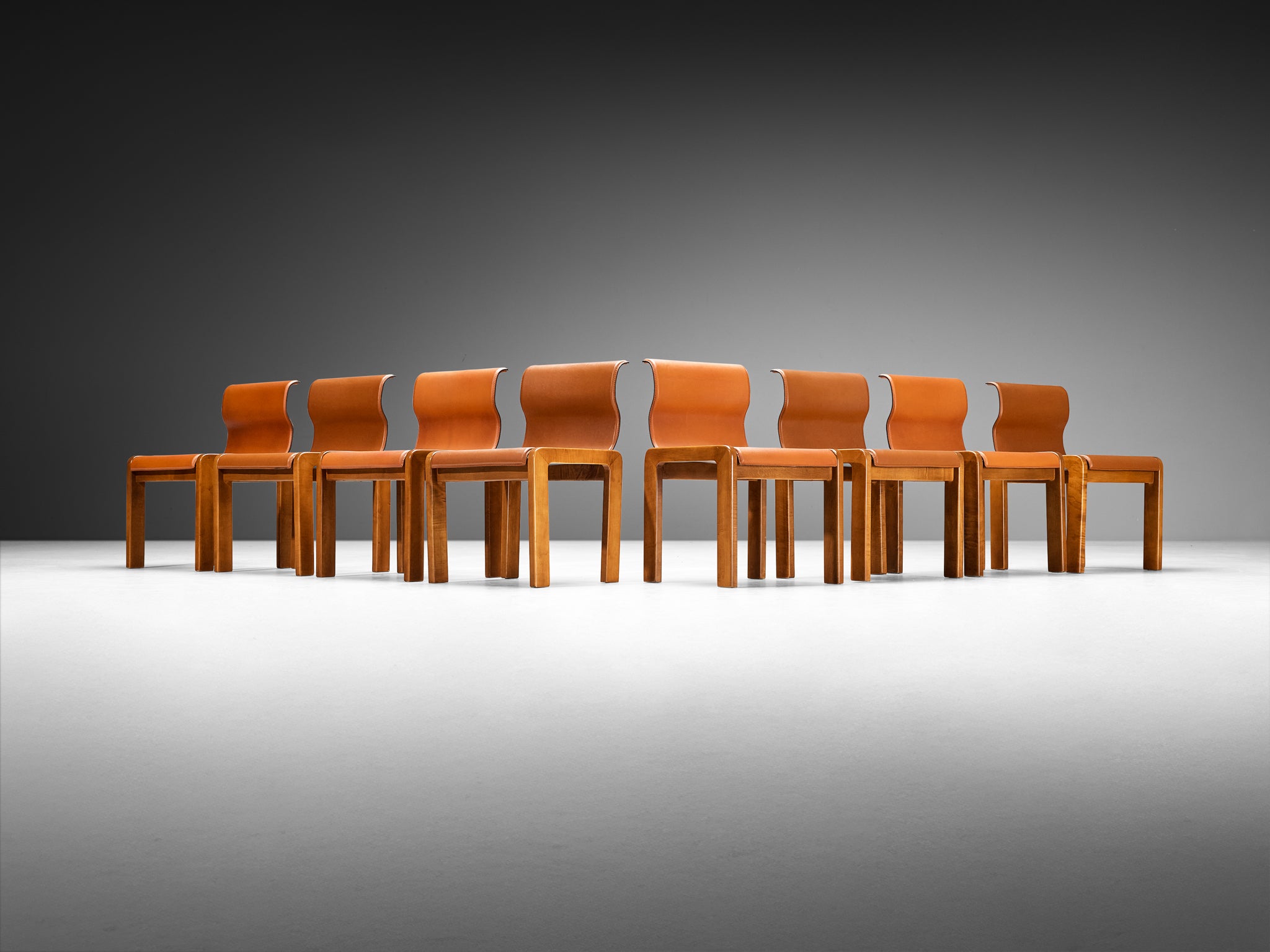 Italian Set of Eight Dining Chairs With Wavy Backrests in Saddle Leather, Walnut Seating Morentz