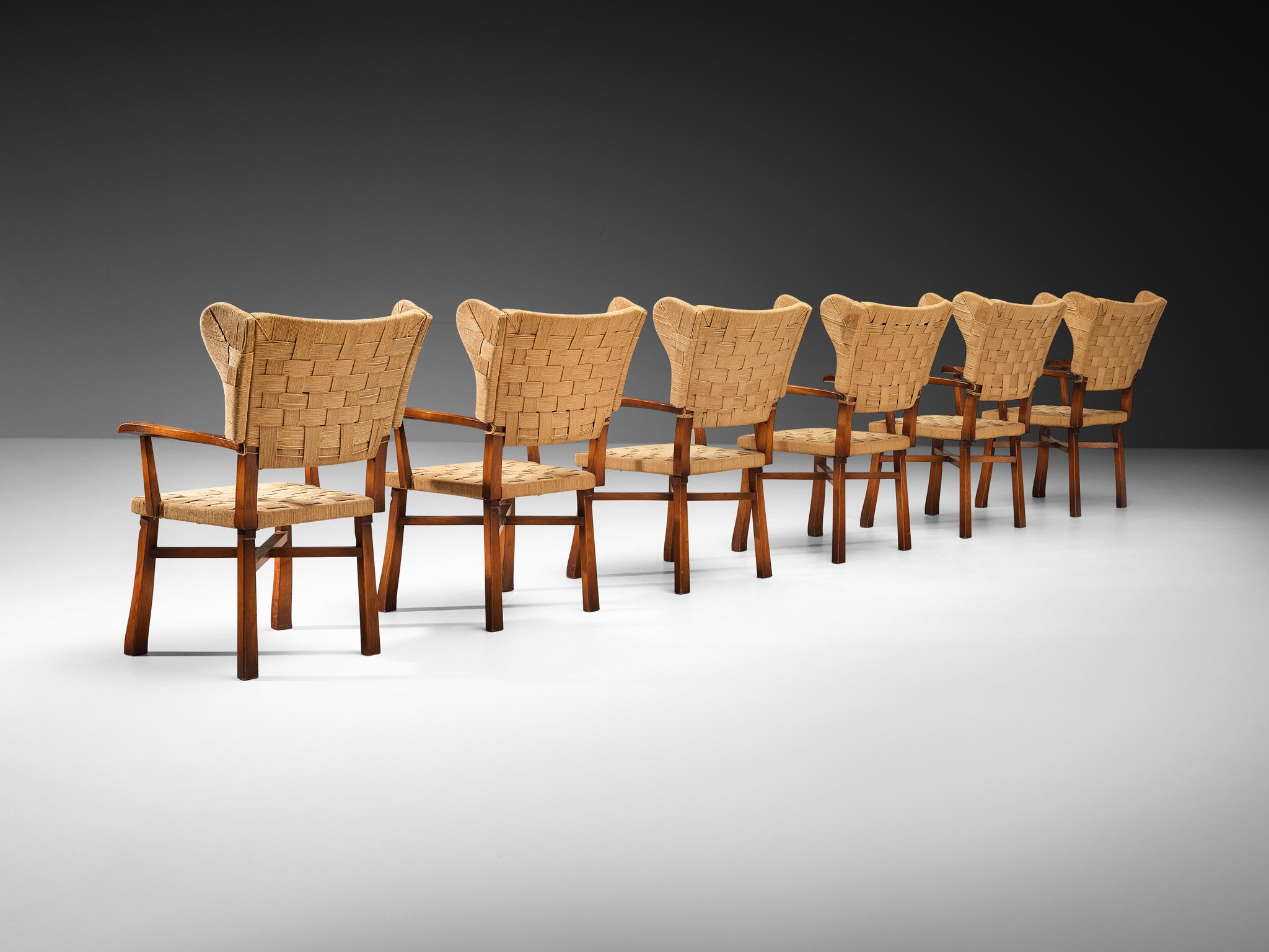 Ernesto Valabrega Set of Twelve Dining Chairs in Chestnut and Braided Cord Seating Morentz