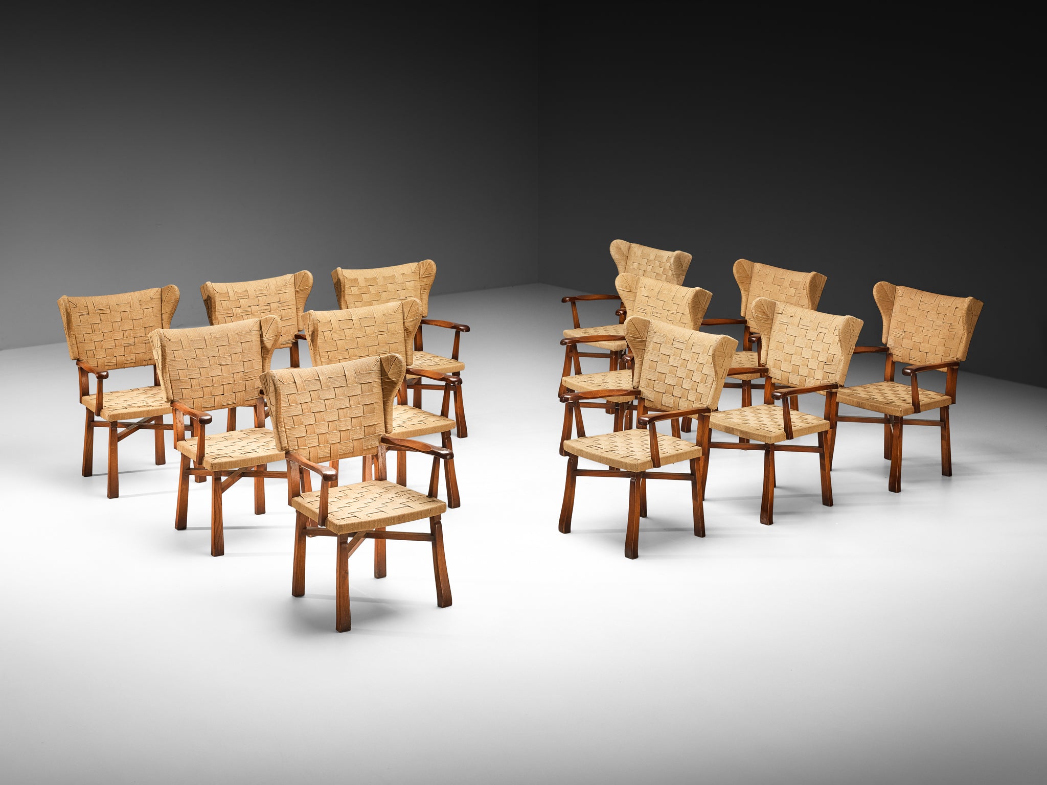 Ernesto Valabrega Set of Twelve Dining Chairs in Chestnut and Braided Cord Seating Morentz