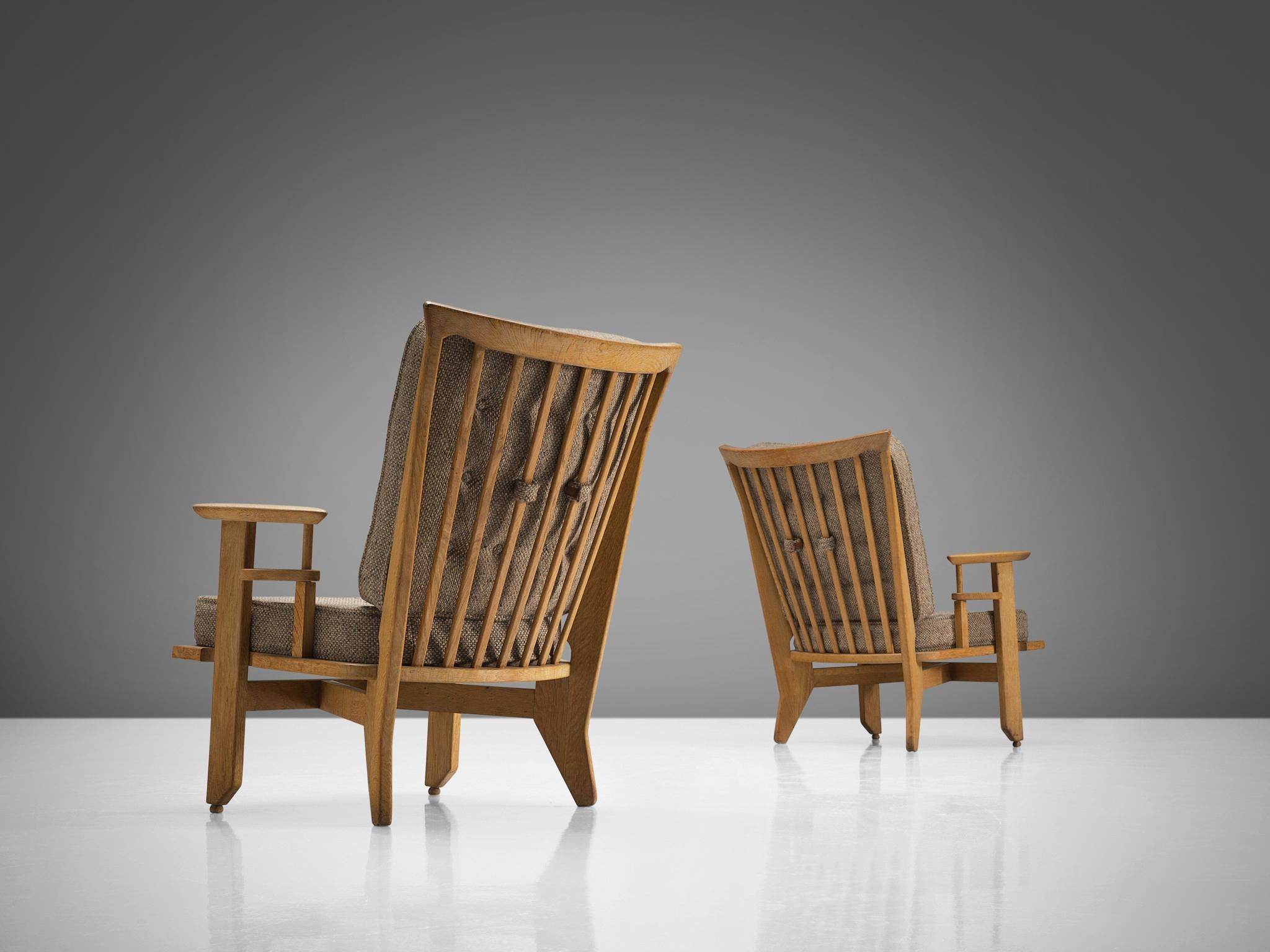 Guillerme & Chambron Pair of Lounge Chairs in Oak and Beige Upholstery