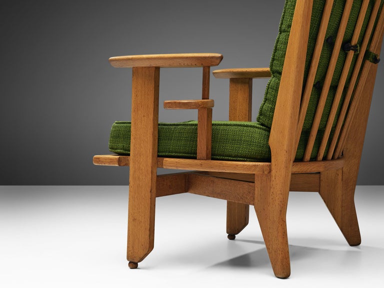 Guillerme & Chambron Pair of Lounge Chairs in Oak and Green Upholstery
