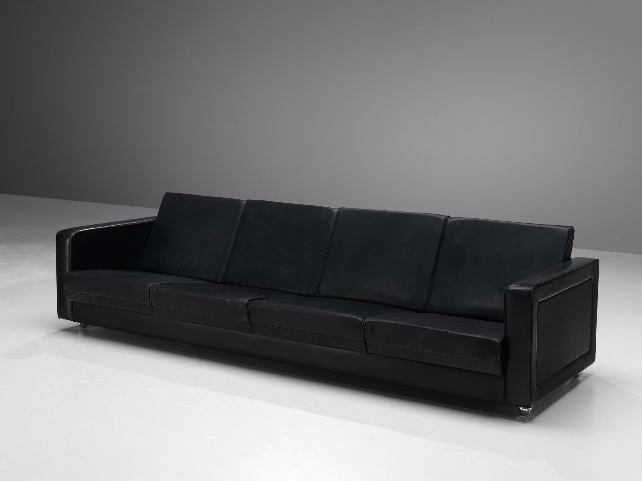 Sleek Four-Seat Danish Sofa in Black Leatherette