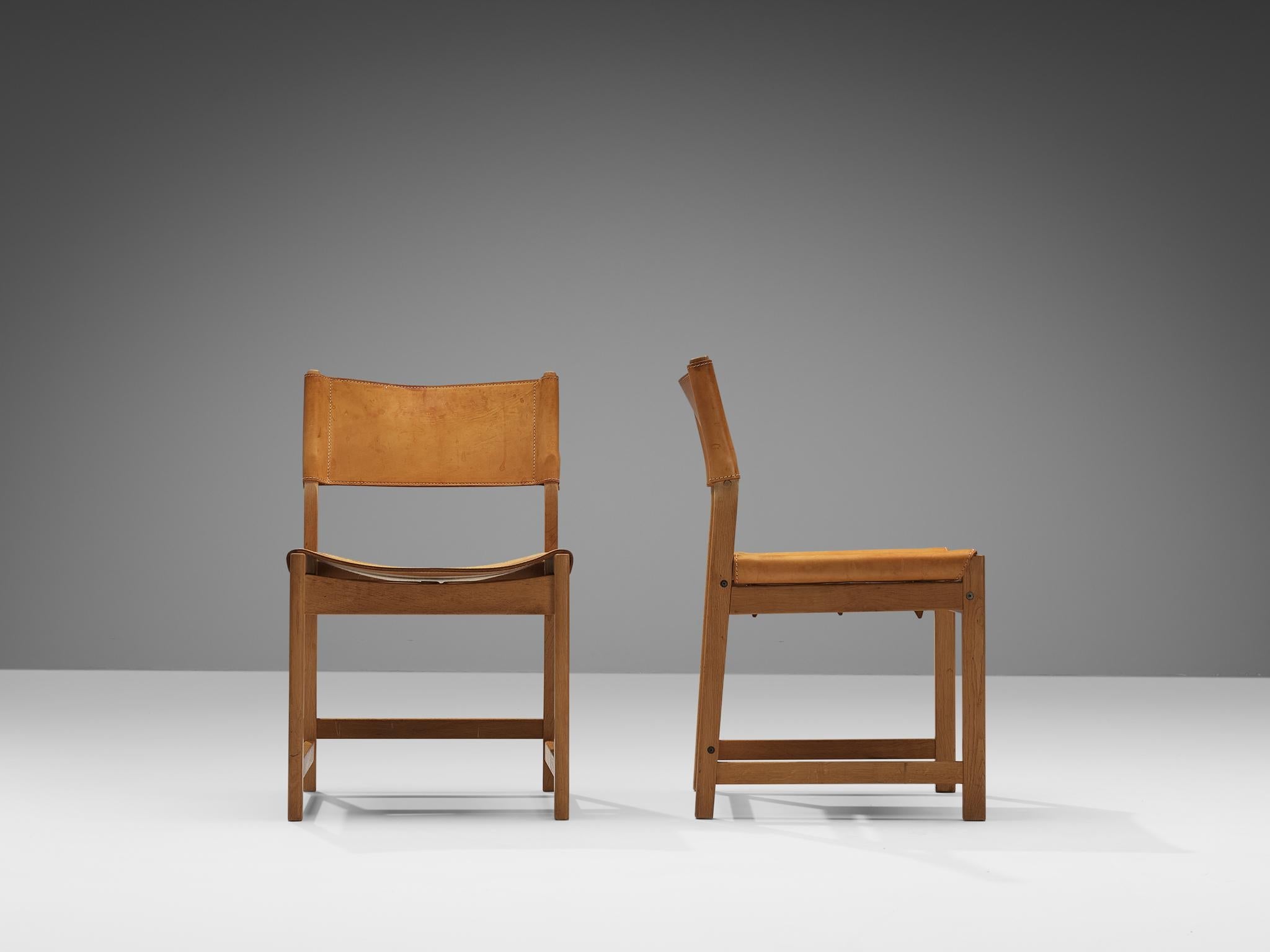 Kurt Østervig for Sibast Pair of Dining Chairs in Cognac Leather and Oak